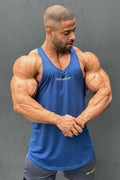 Jed North Performance Max Bodybuilding stringer in denim blue with v-neck and subtle white chest text for athletic use