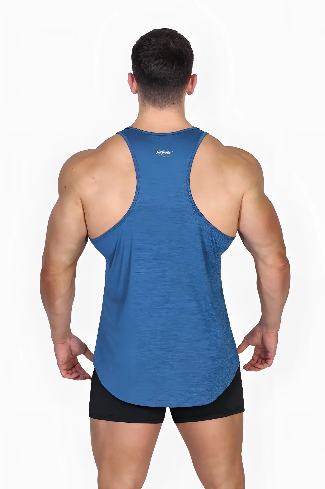 Back view of jed north performance max bodybuilding stringer in denim blue heathered fabric with small white logo