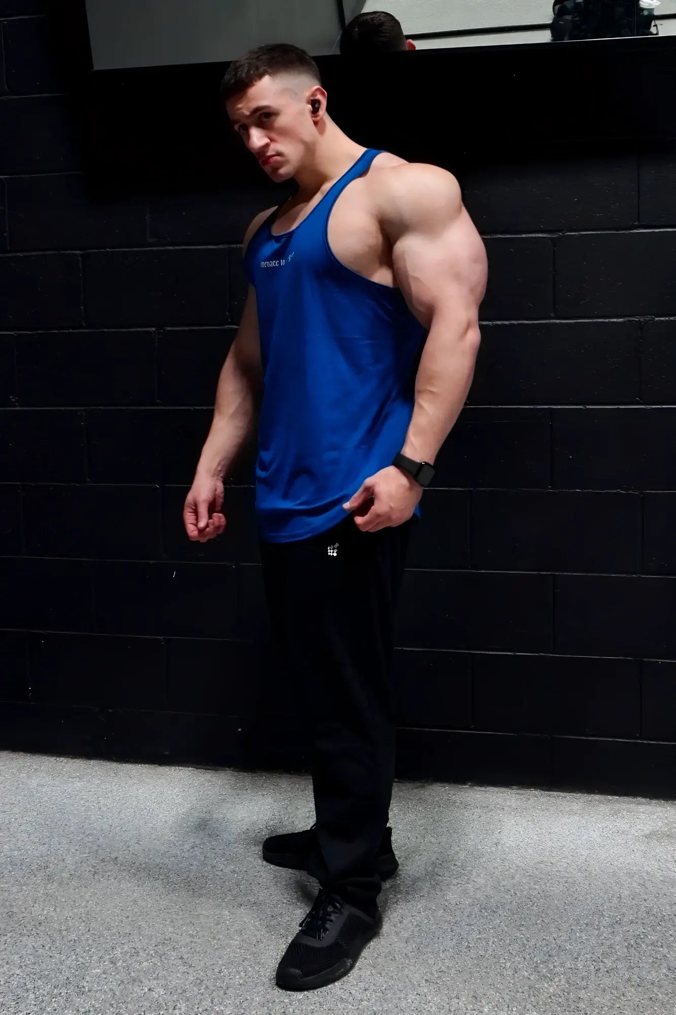 Jed North performance max bodybuilding stringer sleeveless tank top in denim blue with white logo on chest