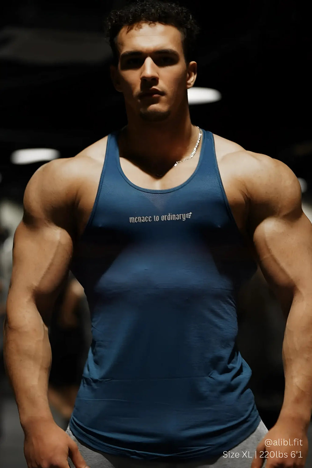 Jed North Performance Max Bodybuilding stringer denim blue tank top with menace to ordinary print in white across chest