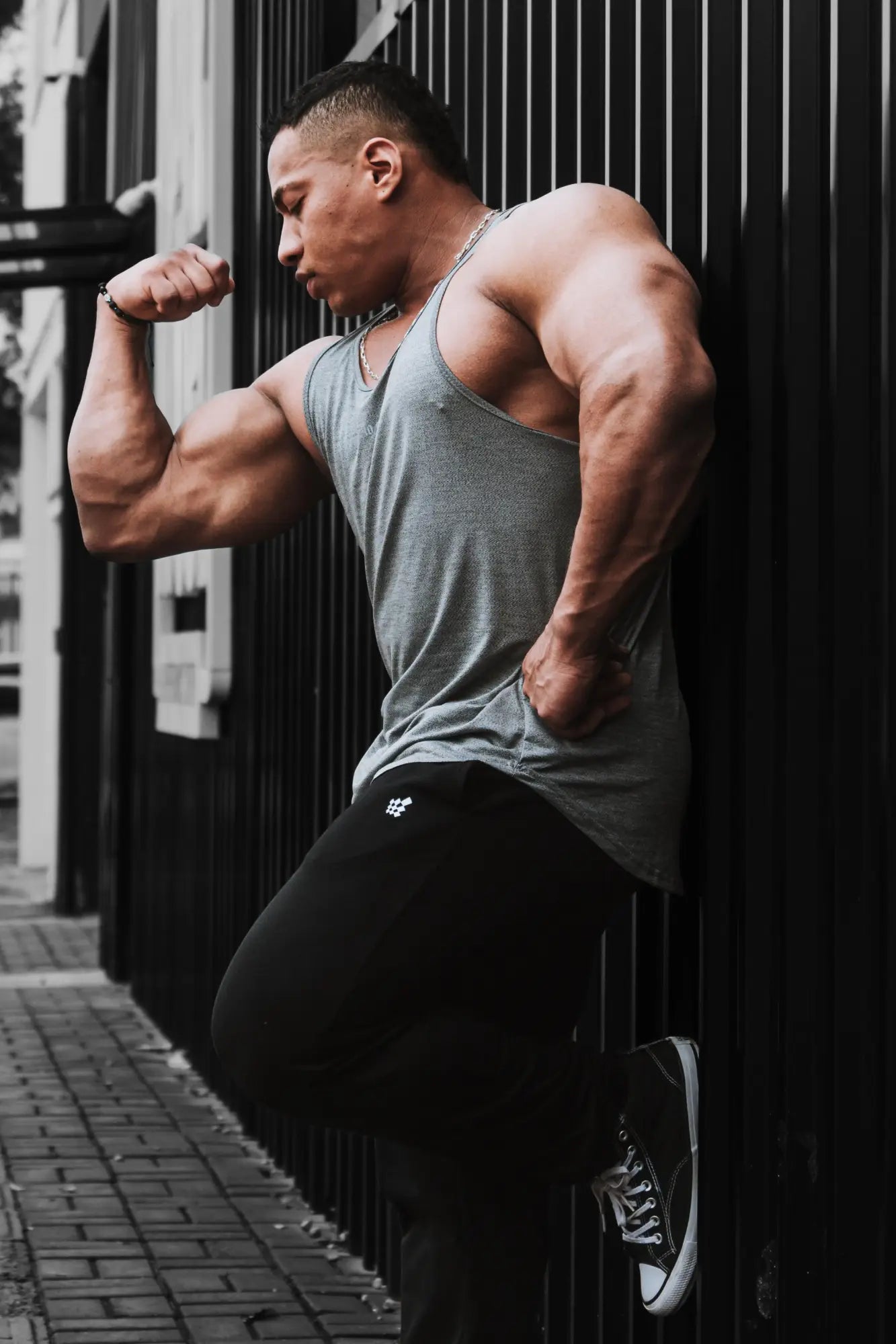 Gray jed north performance max bodybuilding stringer tank top with subtle textured weave and small white logo