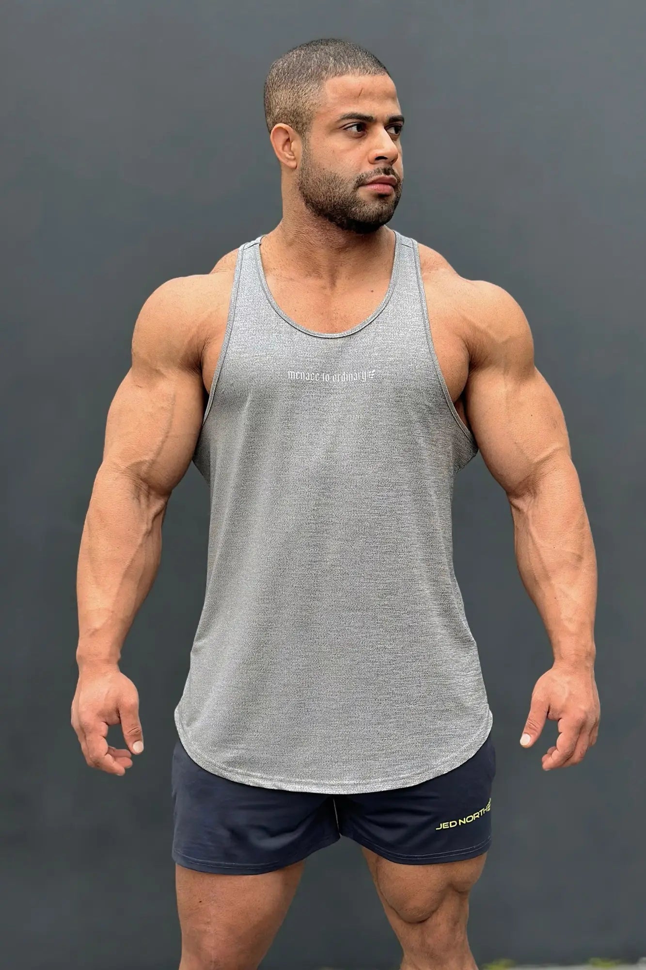 Gray textured heather gray jed north performance max bodybuilding stringer tank top with subtle white logo on chest