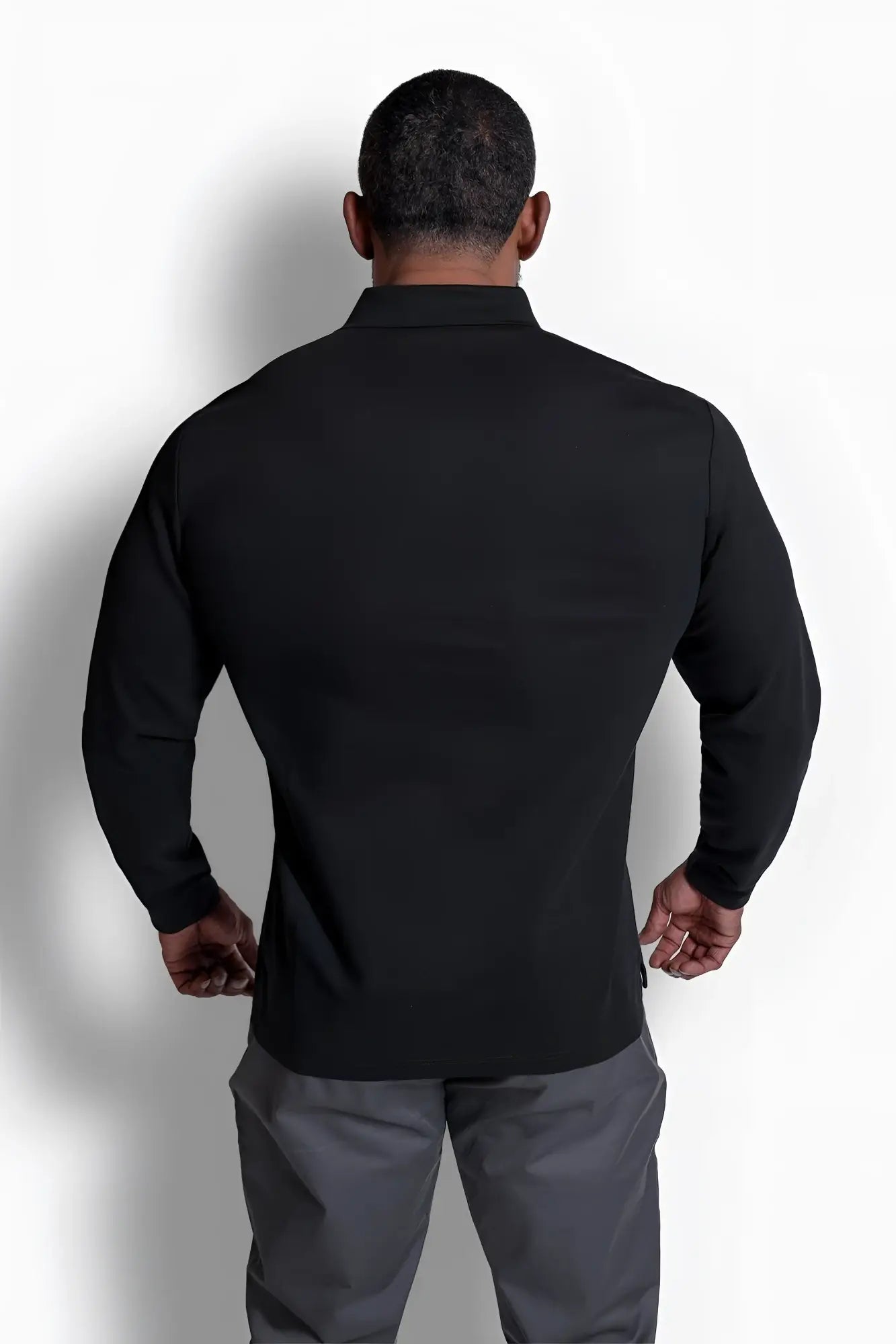 Black tailored fit long-sleeve polo button-up shirt with ribbed collar made from soft fabric for versatile wear