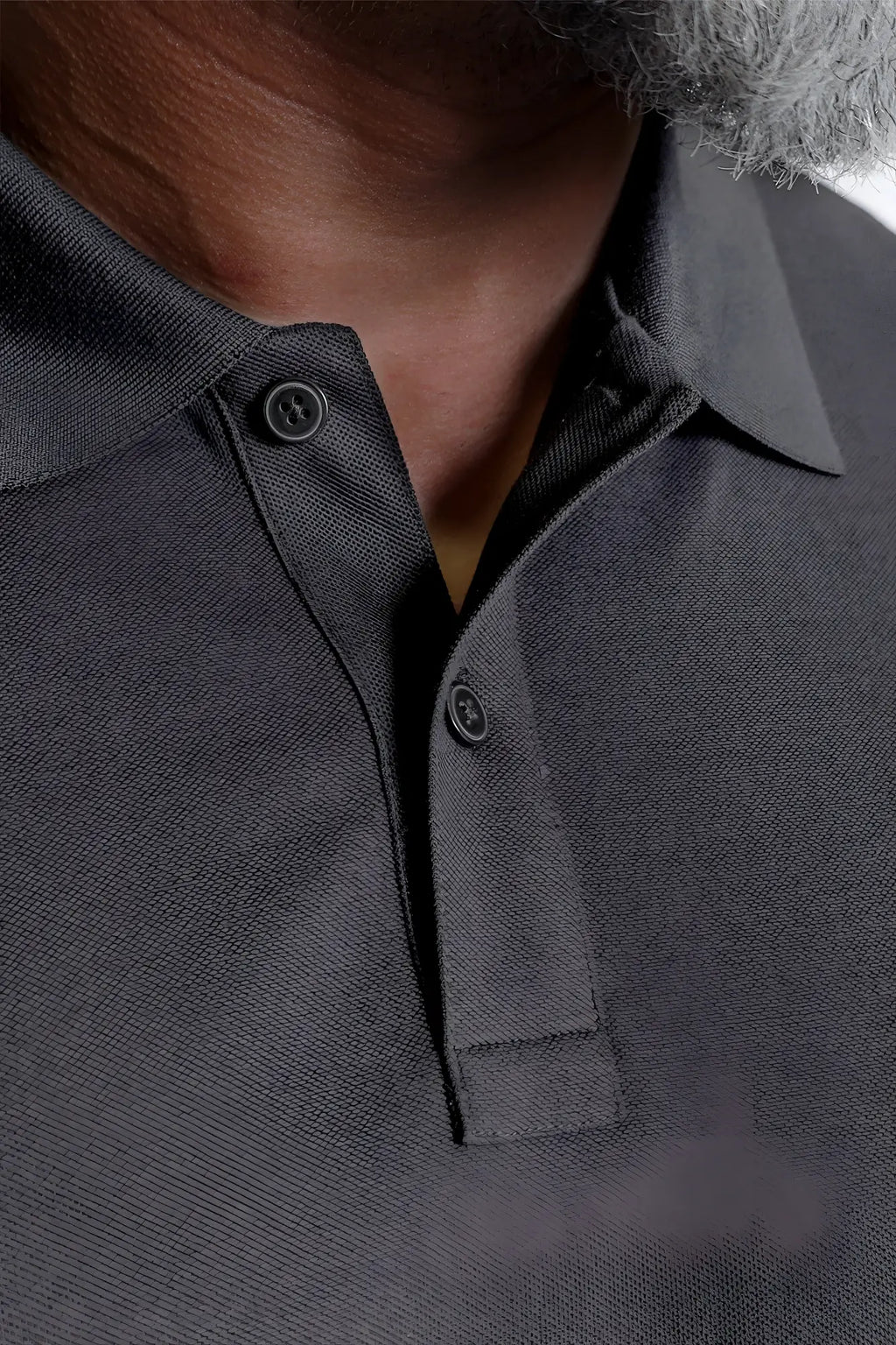 Dark gray pique polo shirt with classic collar and matching buttons in cool olive long sleeve style