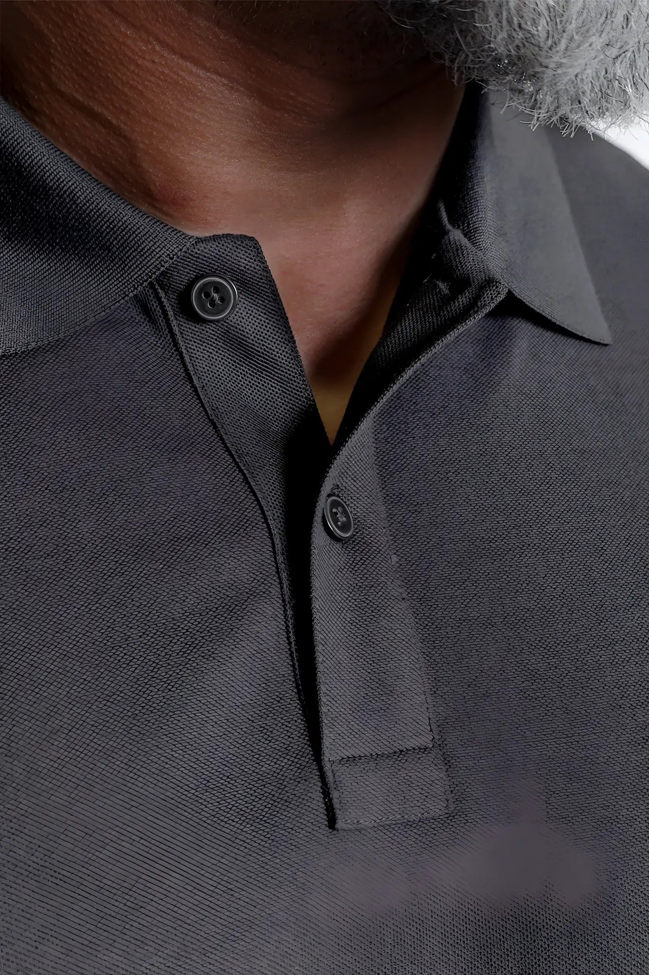 Dark gray pique polo shirt with classic collar and matching buttons in cool olive long sleeve style