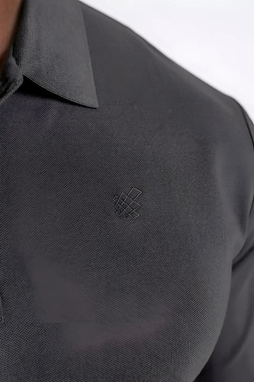 Dark gray polo button-up longsleeve with subtle textured weave and small embroidered logo on the chest