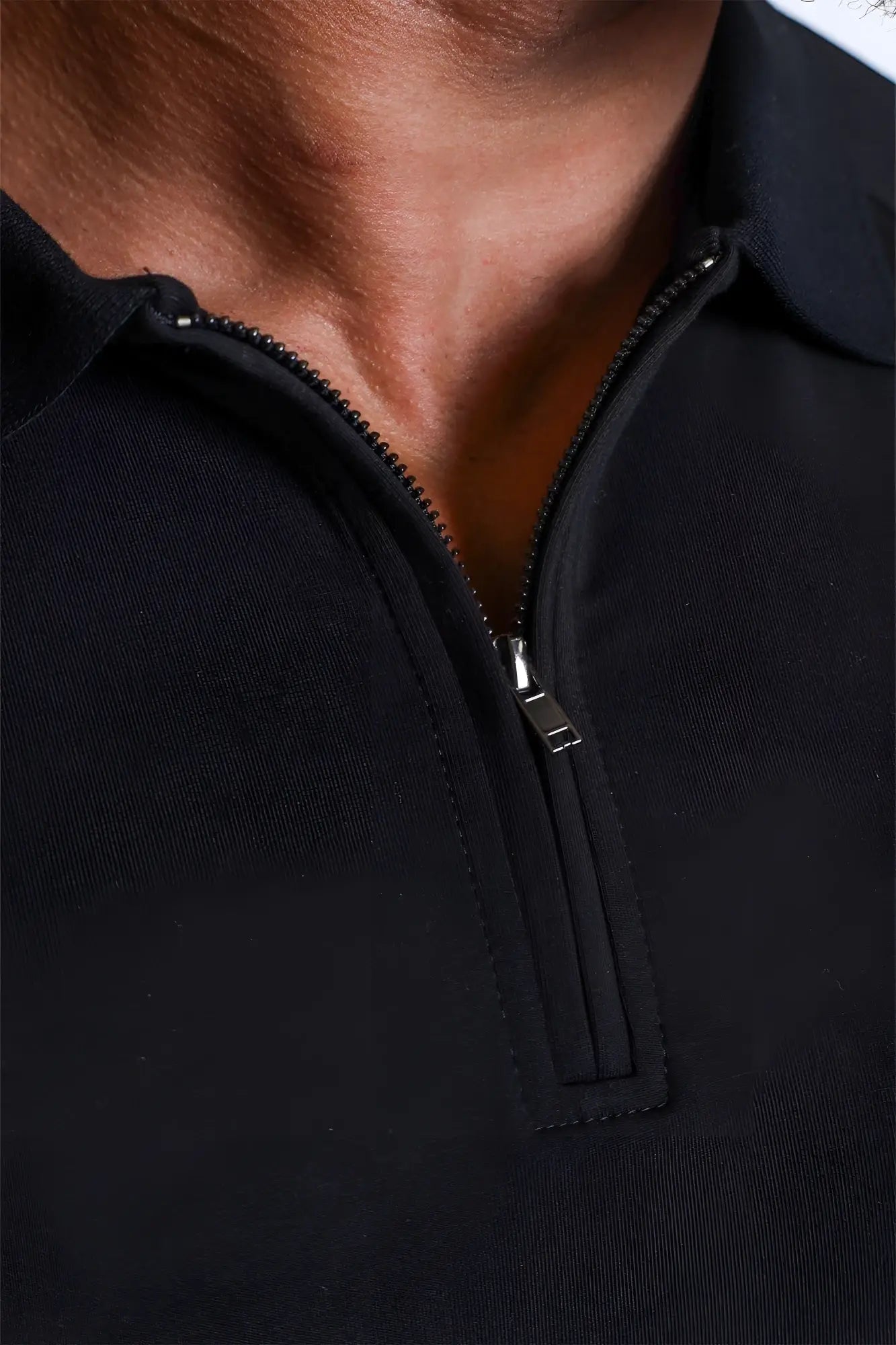 Black premium muscle-fit half-zip polo tee with sleek modern design and subtle stitching details