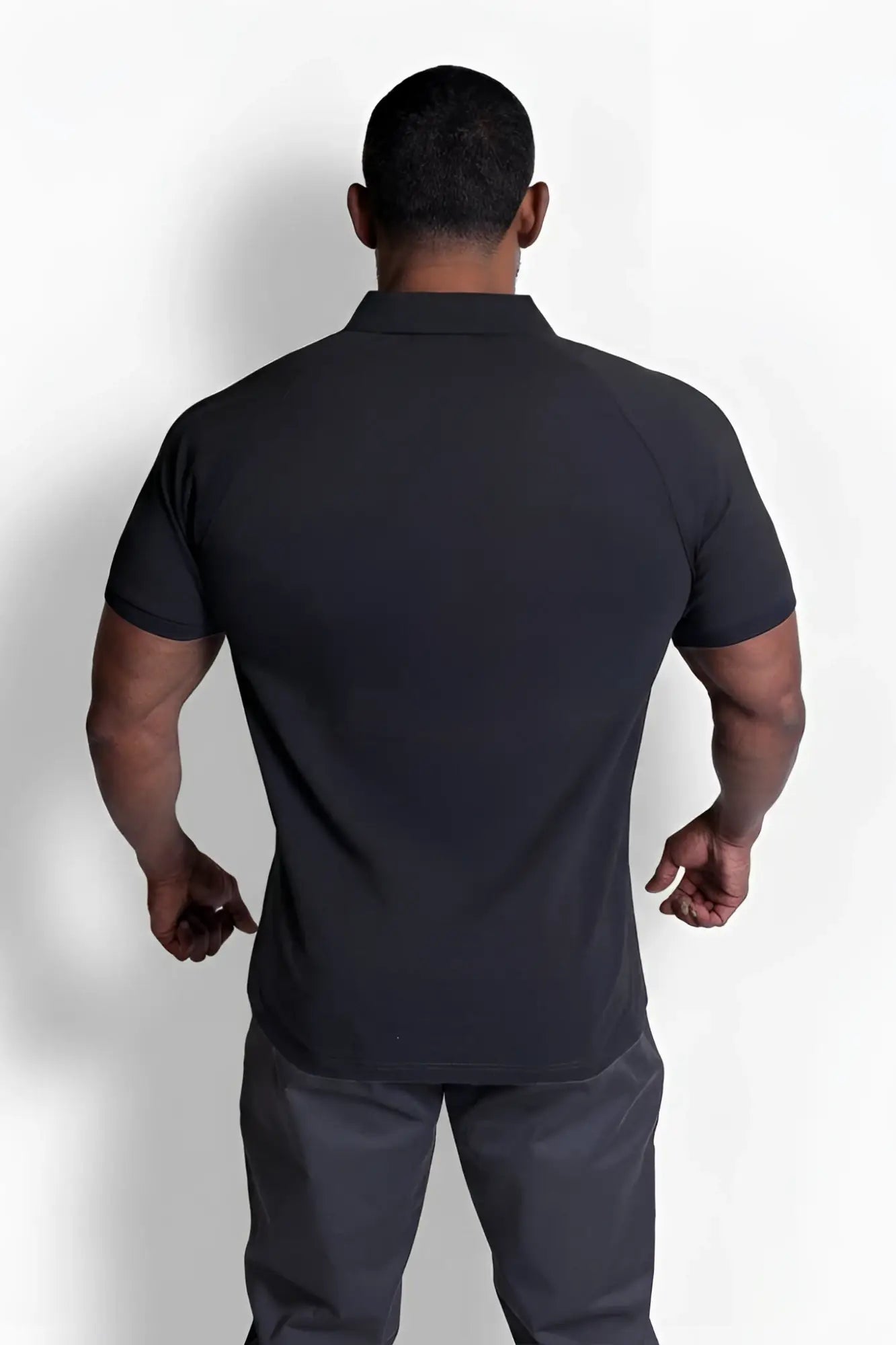 Black premium muscle-fit polo tee with short sleeves zipper and classic collar for a tailored fit look