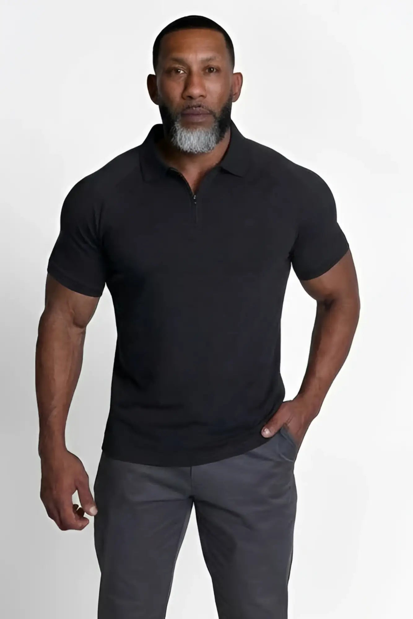 Black premium muscle-fit polo tee with short sleeves and half-zip collar made of soft breathable fabric