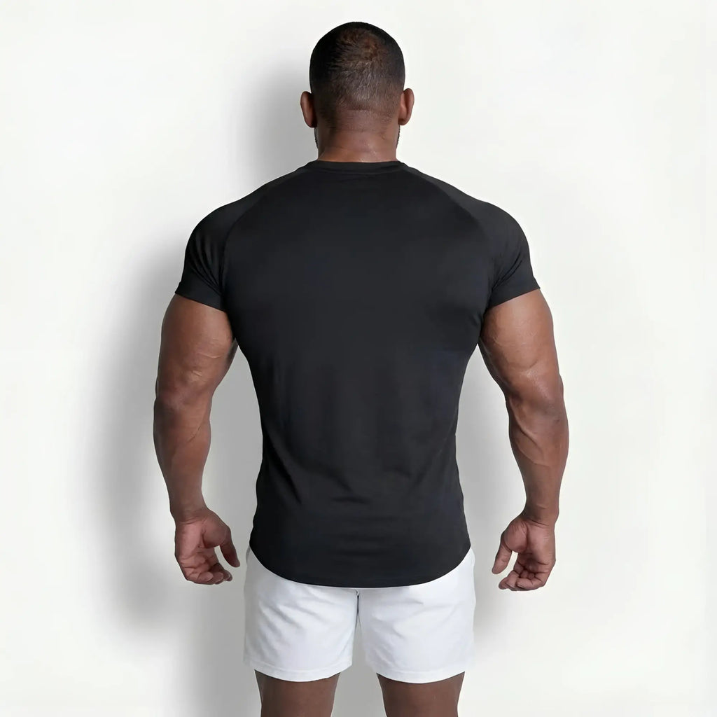 Black premium training tee with fitted cut and raglan short sleeves designed for athletic performance