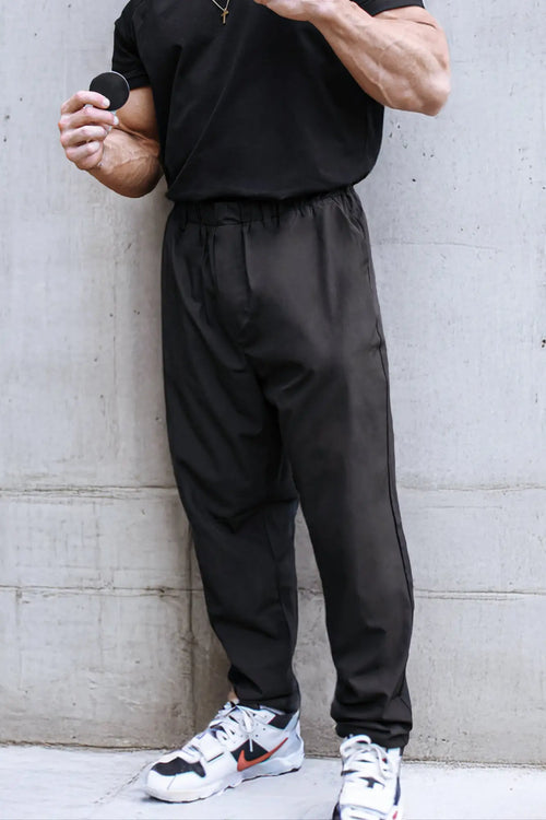 Black jed north quick-dry tech joggers with drawstring waist and tapered legs designed for athletic use