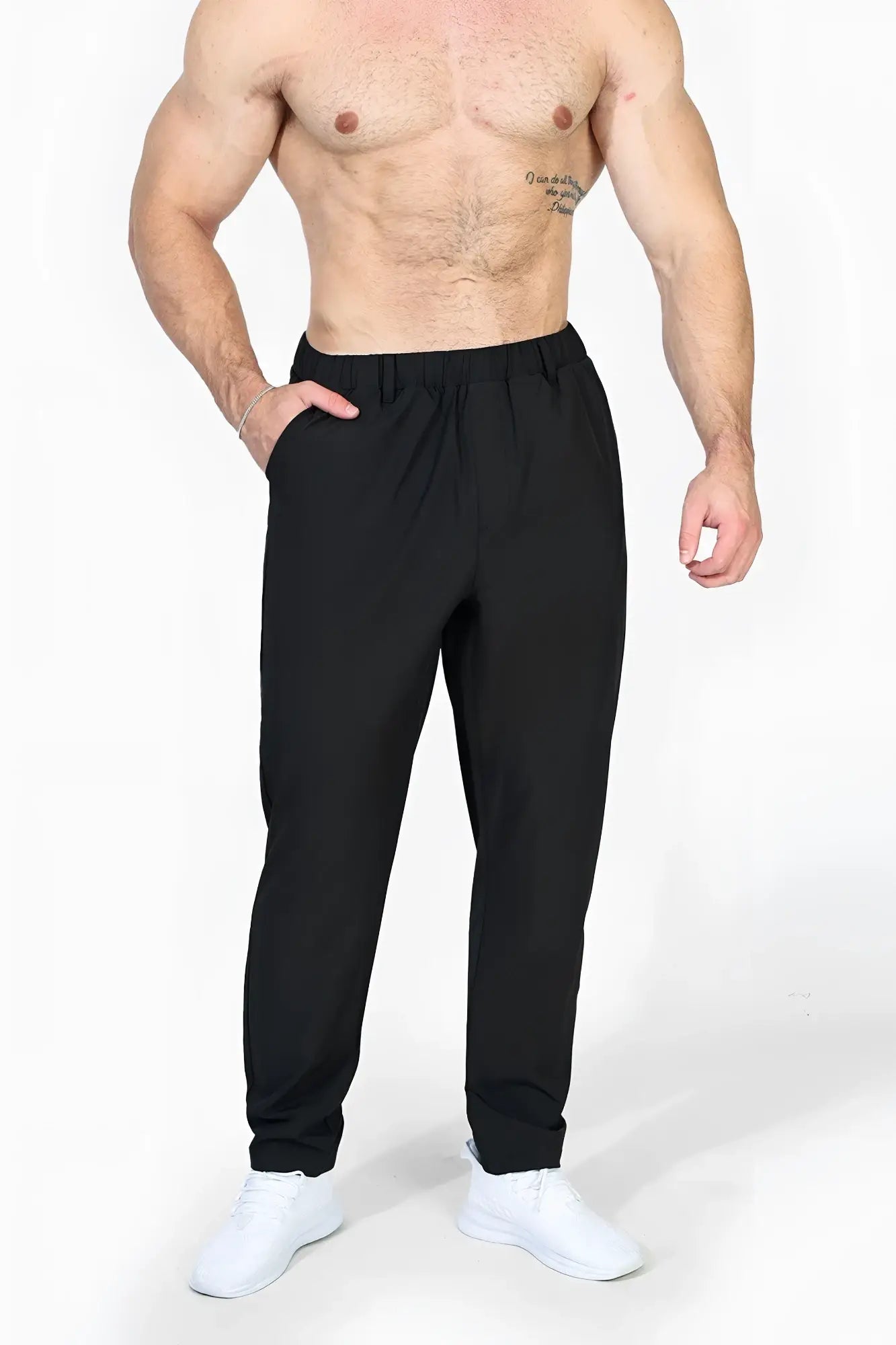Jed North quick-dry tech pants are black elastic-waist joggers with a sleek tapered fit and subtle side pockets
