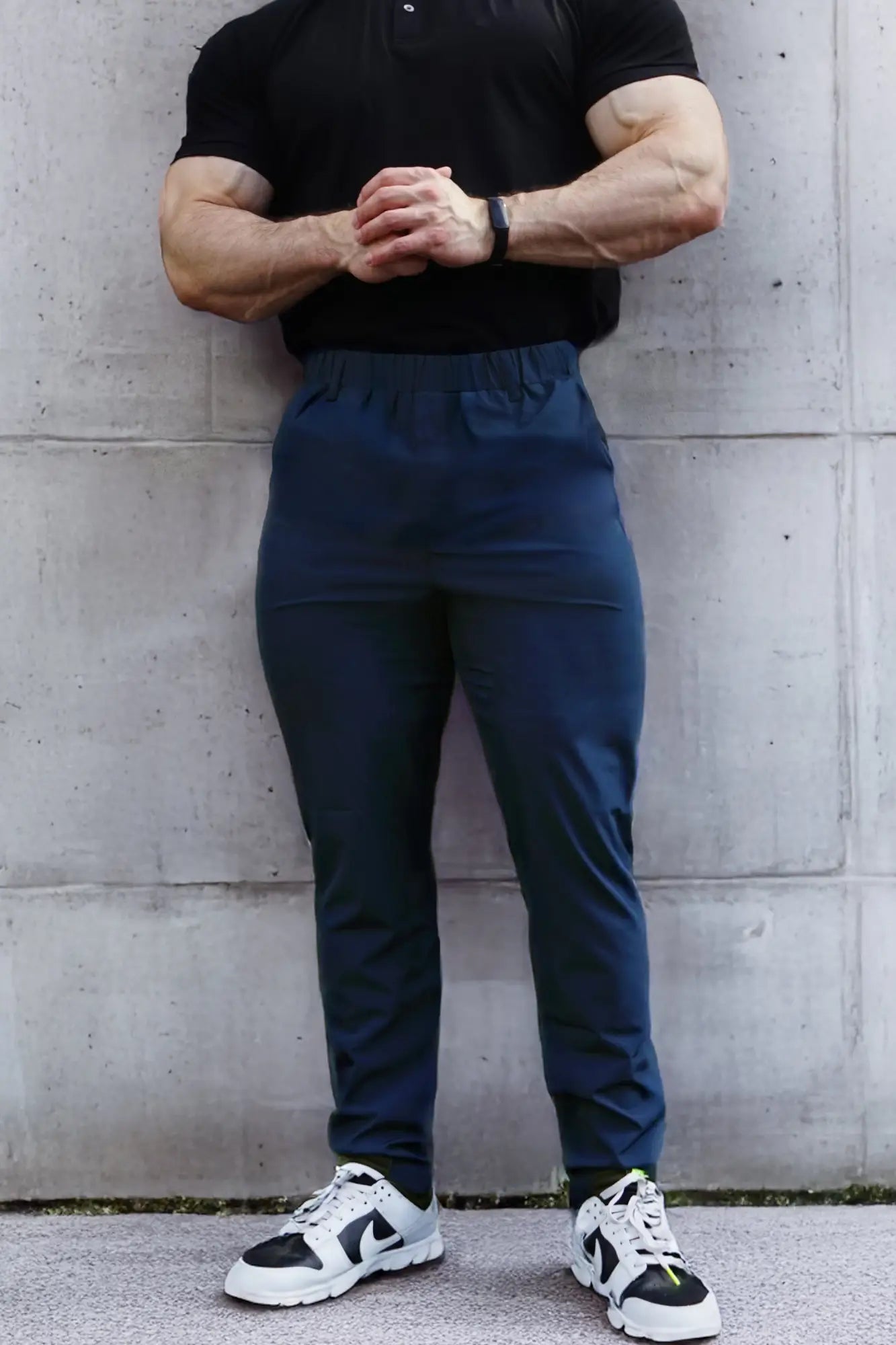 Navy blue Jed North quick-dry tech pants with elastic waistband and subtle side pockets for athletic use
