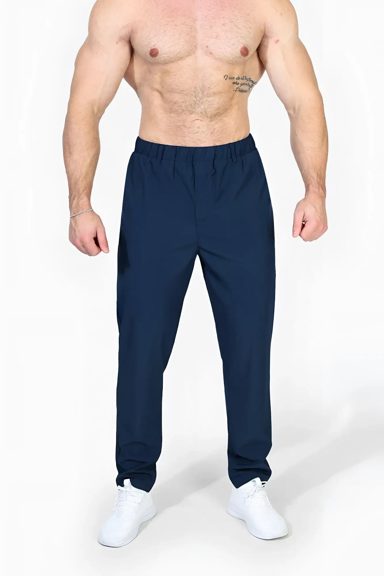Navy jed north quick-dry tech pants with elastic waistband and tapered legs designed for athletic performance