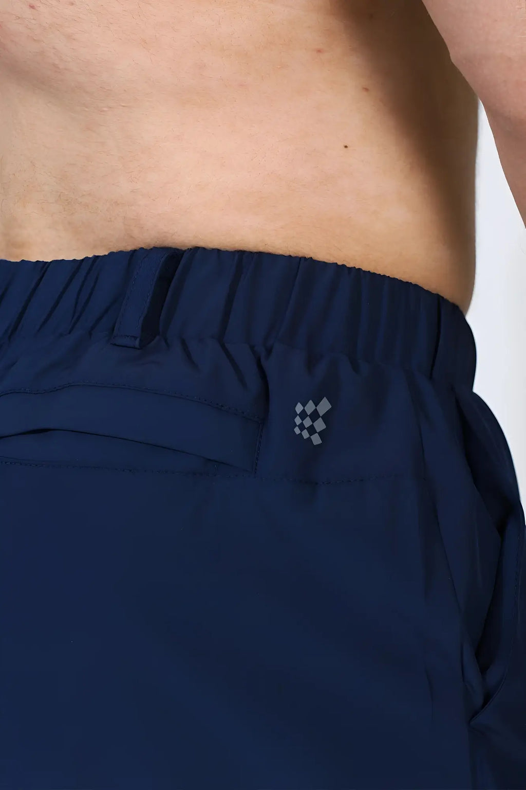 Navy blue Jed North quick-dry tech athletic shorts with a subtle gray checkered logo on the waistband