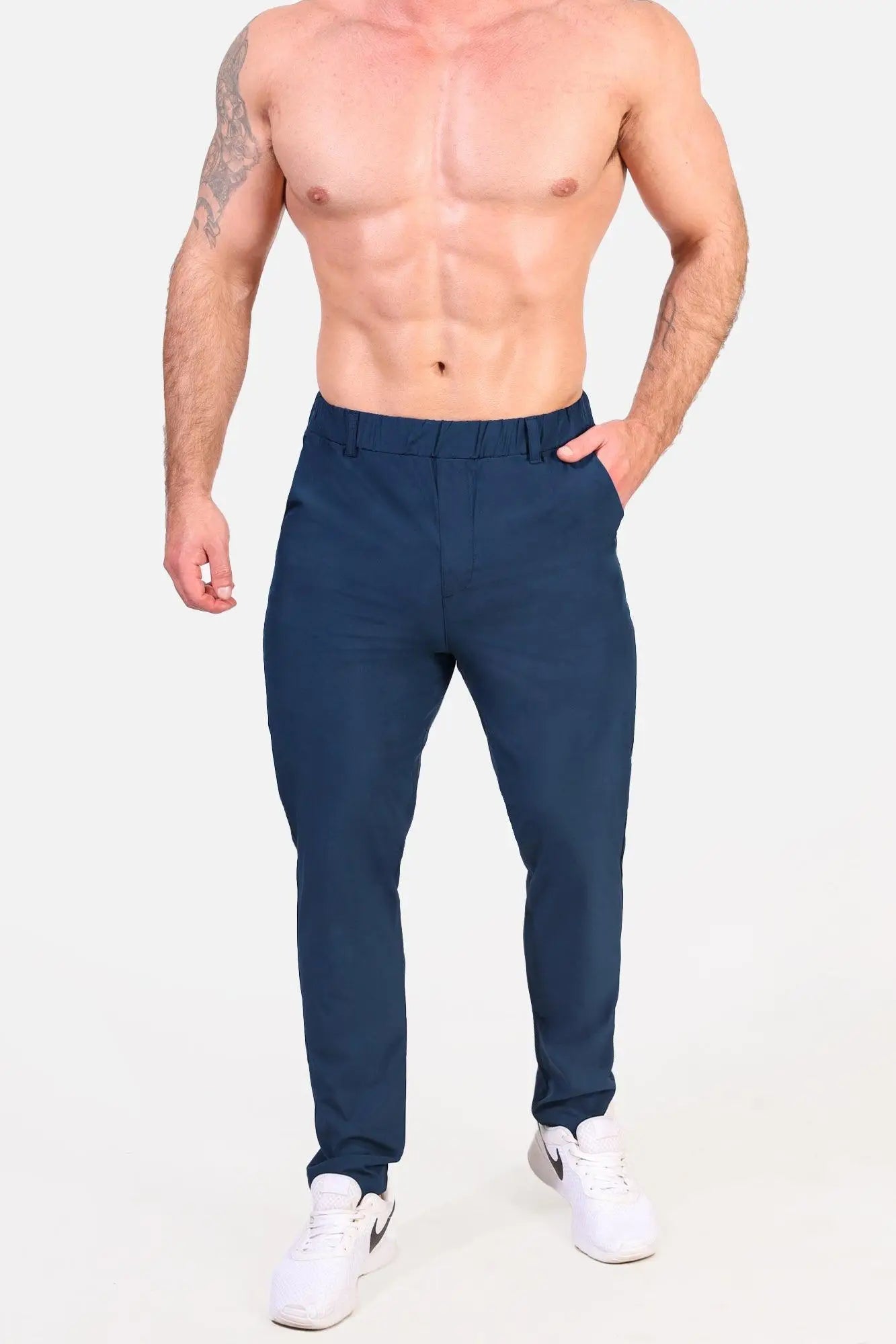 Dark blue slim-fit Jed North quick-dry tech pants with tailored waistband and straight-leg cut for active wear