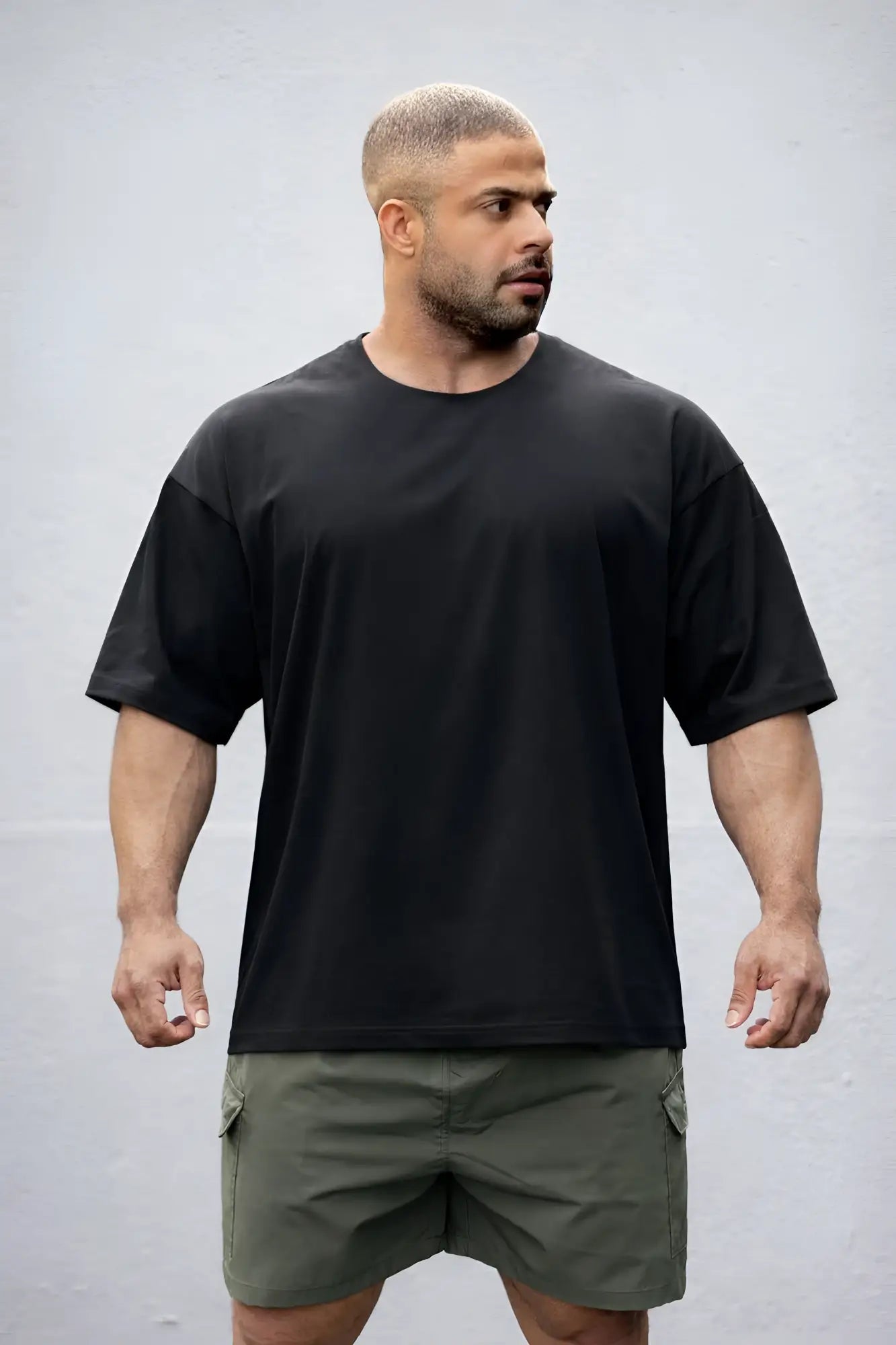 Black raw-cut boxy crop tee oversized crewneck t-shirt with relaxed fit and short sleeves