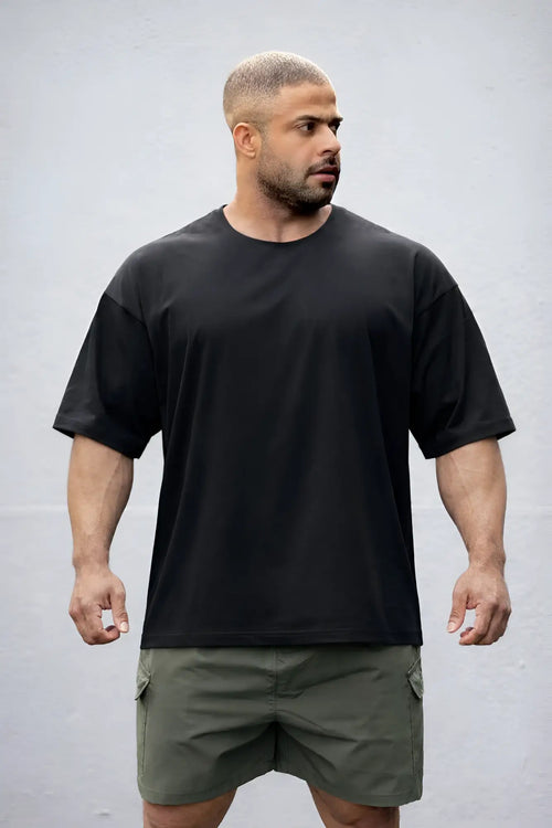 Black raw-cut boxy crop tee oversized crewneck t-shirt with relaxed fit and short sleeves