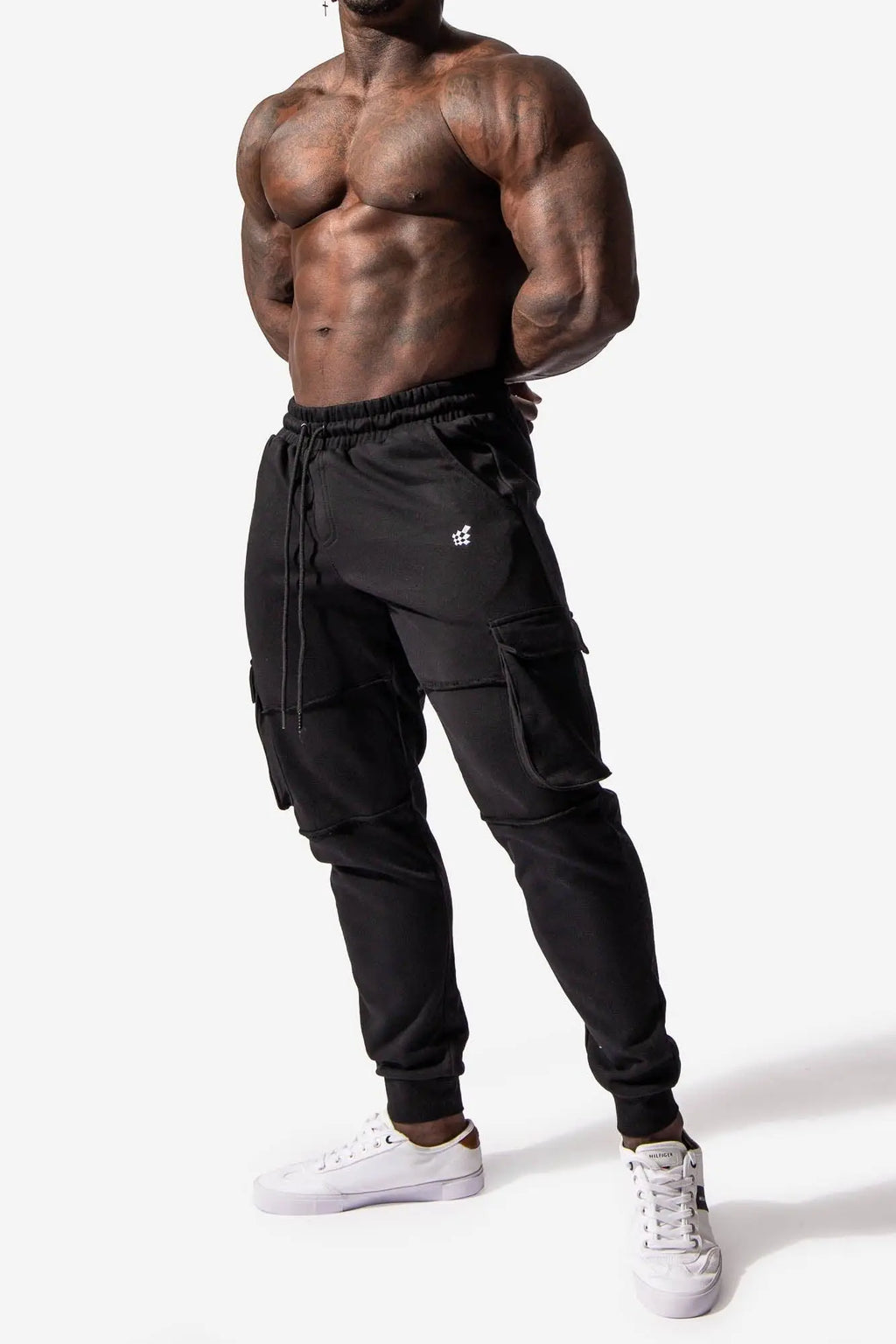 Black renegade cargo joggers with elastic waistband drawstring multiple side pockets and white logo on thigh