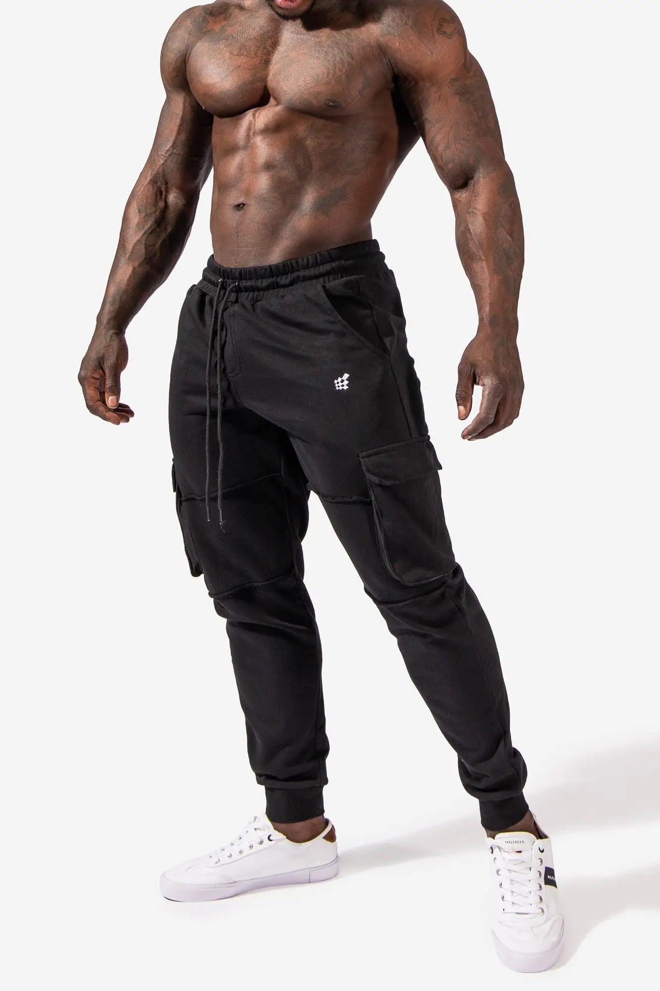 Renegade cargo joggers black with elastic waistband drawstring multiple side pockets and small white logo on left thigh