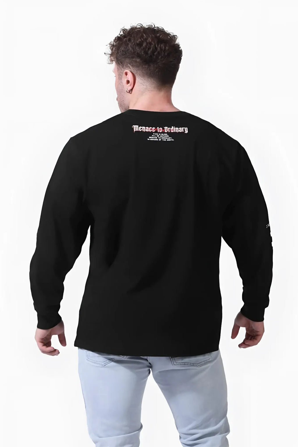Back view of jed north retro gym black long sleeve t-shirt with red gothic-style text on the fabric