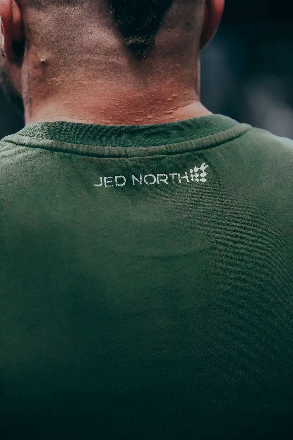 Dark green cotton retro oversized muscle tee with jed north embroidered on the back neckline