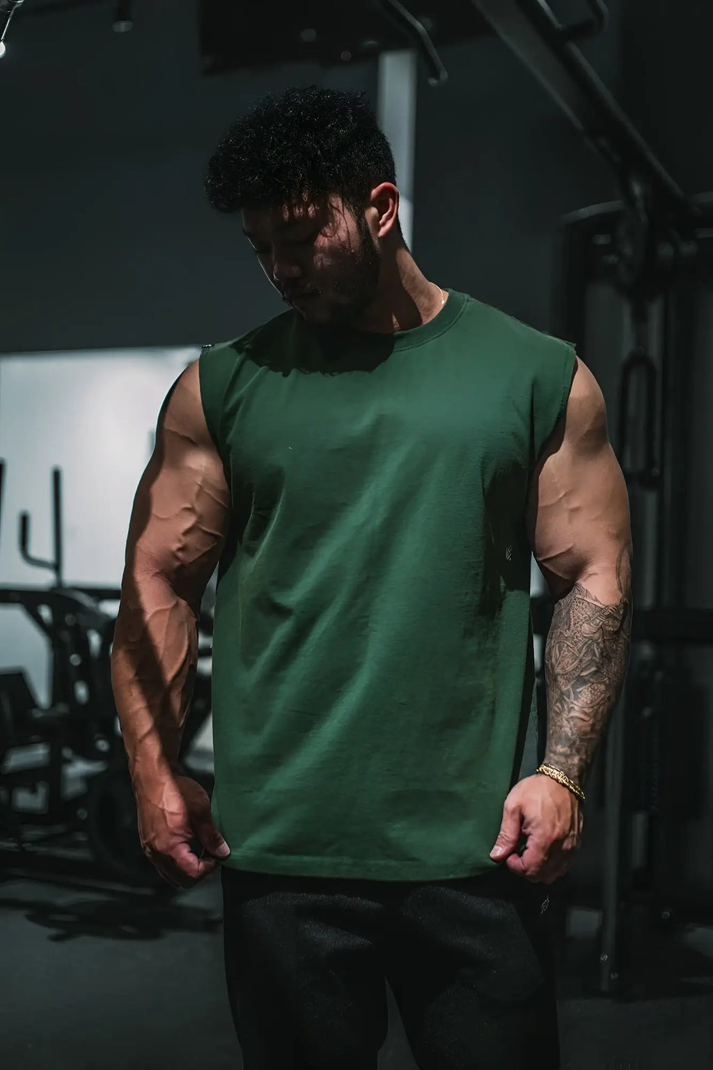 Dark green cotton sleeveless tank top with a simple crew neckline retro oversized muscle tee forest green