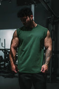 Dark green cotton sleeveless tank top with a simple crew neckline retro oversized muscle tee forest green