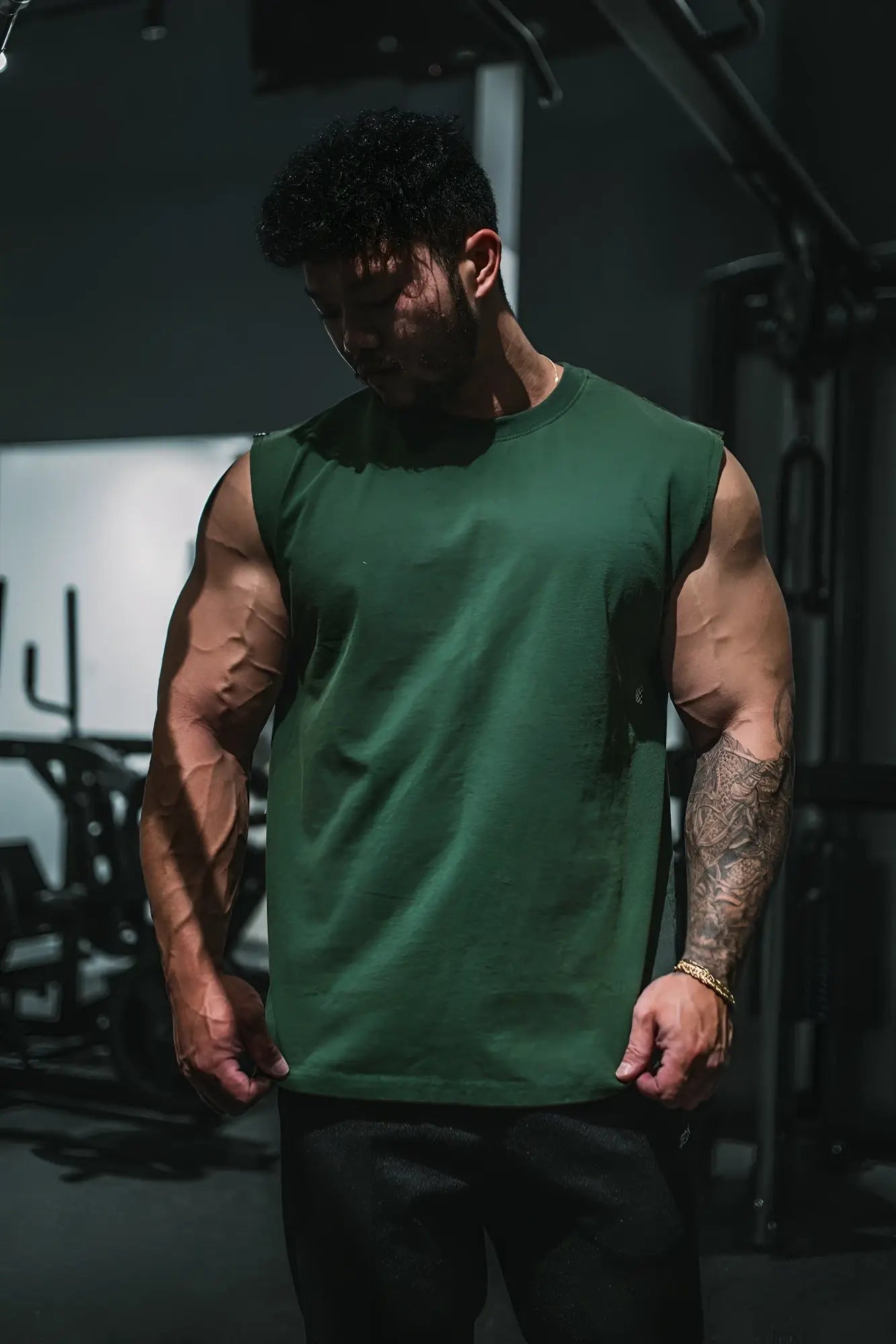 Dark green cotton sleeveless tank top with a simple crew neckline retro oversized muscle tee forest green