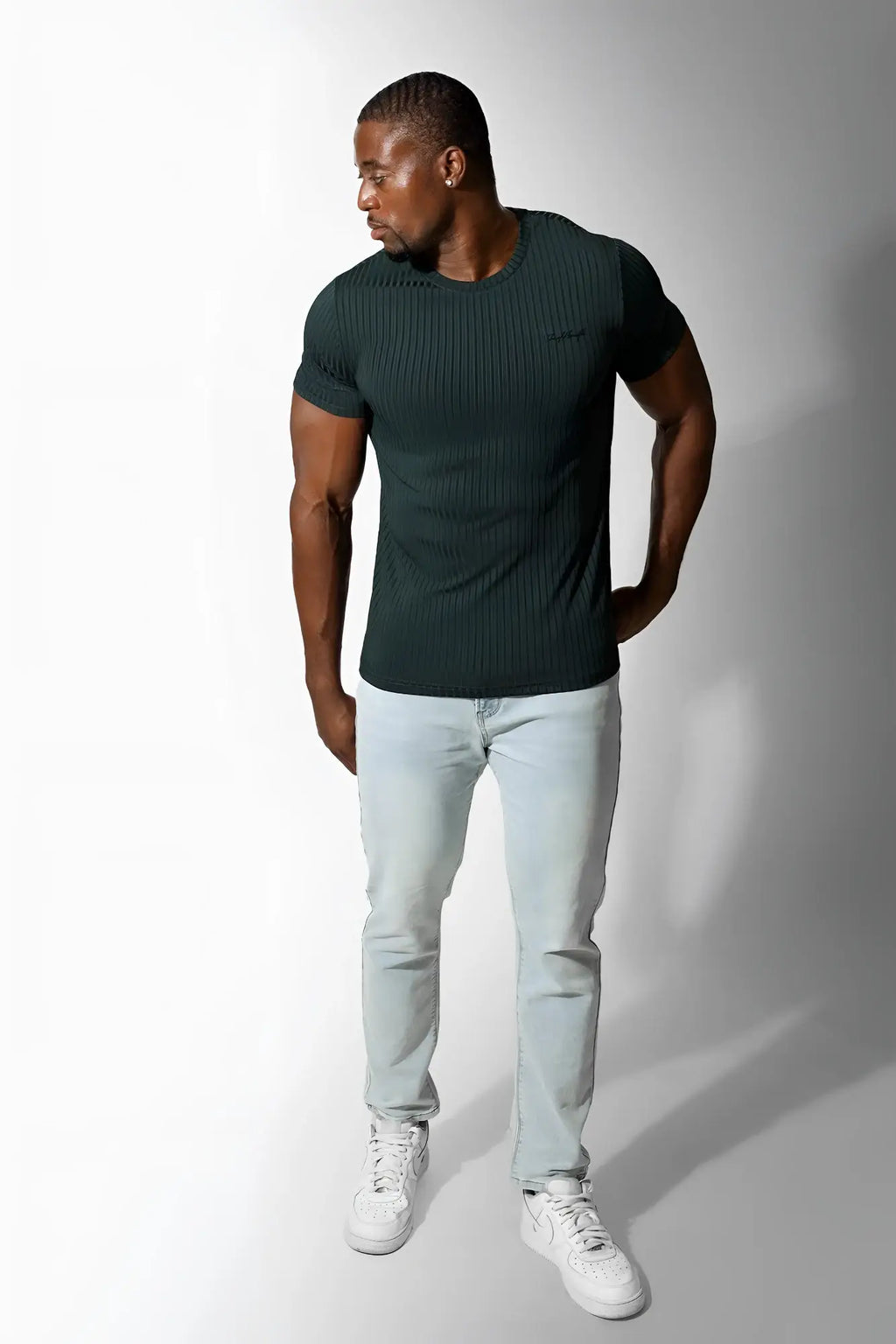 Dark green ribbed knit short sleeve jed north muscle fit t shirt in forest green shown from the front