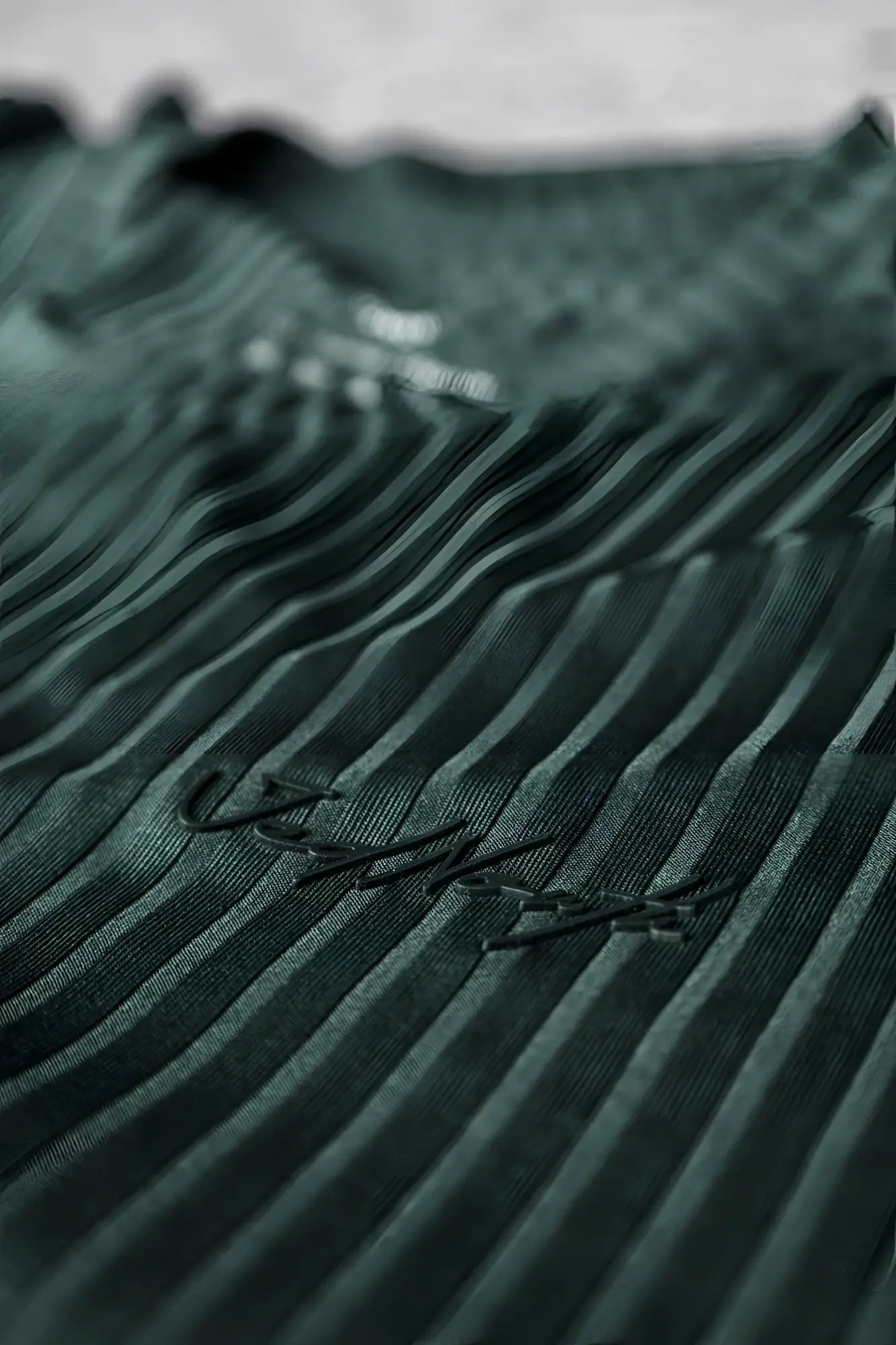Dark green ribbed knit jed north muscle-fit t-shirt with subtle black embroidered logo in forest green
