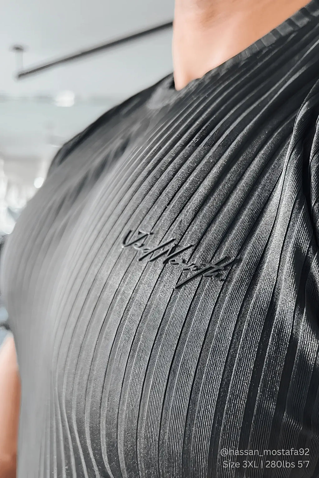 Black ribbed muscle-fit t-shirt by jed north in jet black with subtle embroidered logo on chest