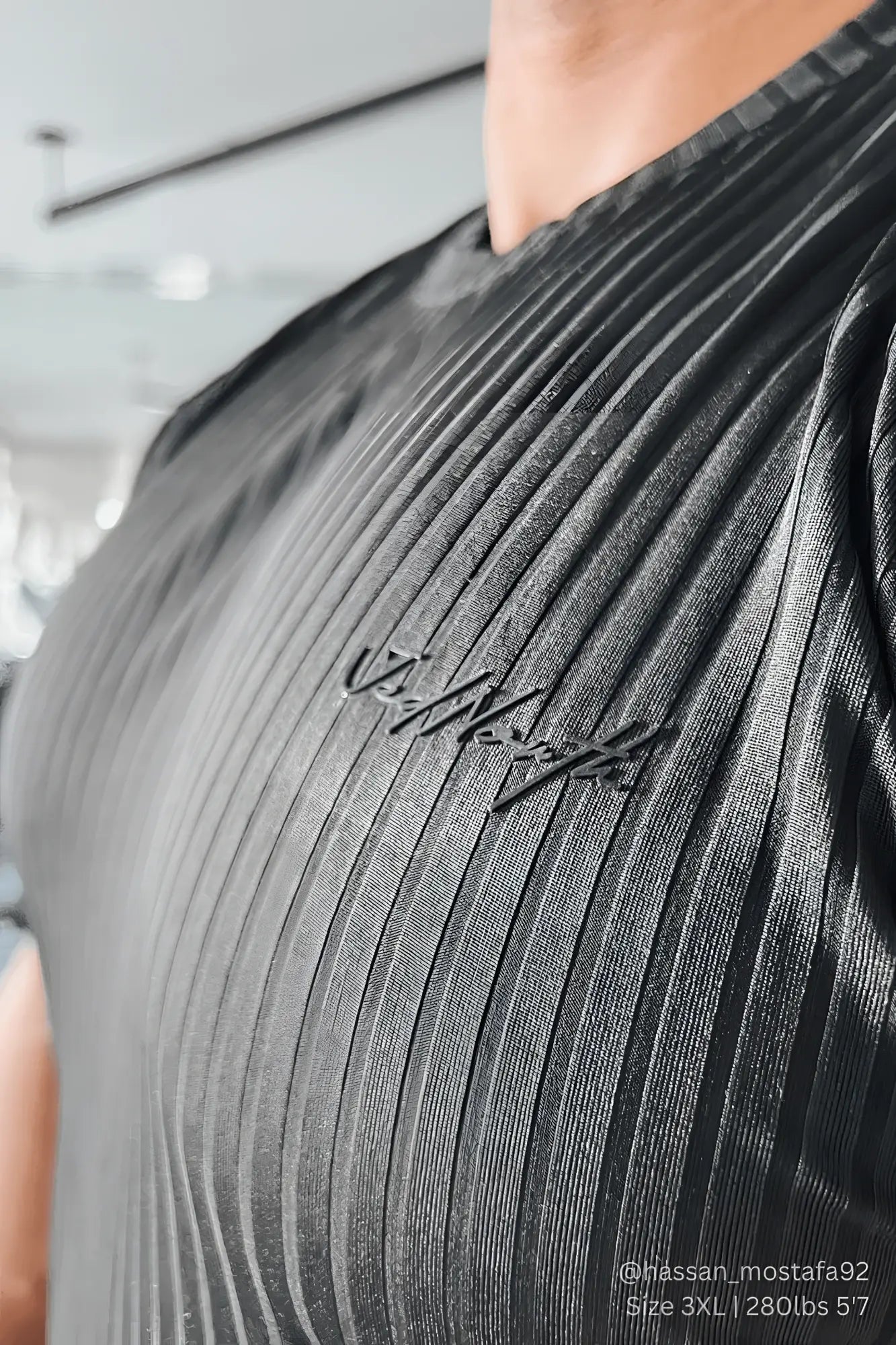 Black ribbed muscle-fit t-shirt by jed north in jet black with subtle embroidered logo on chest