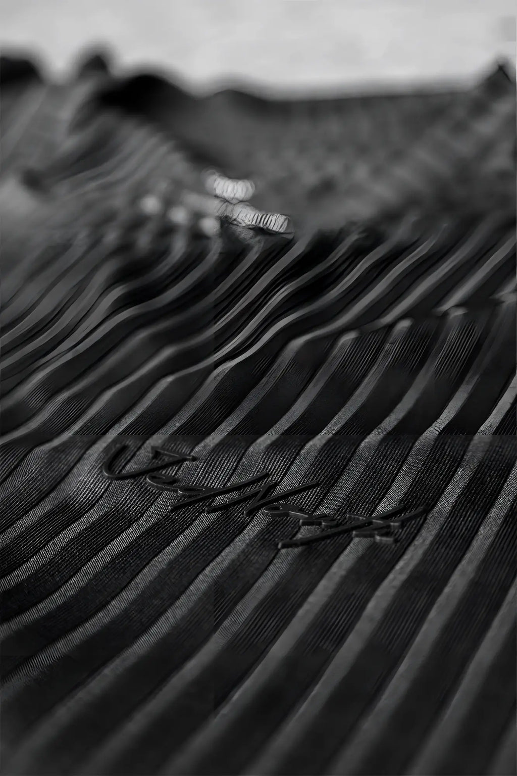 Jed North ribbed muscle fit t shirt in jet black featuring subtle vertical stripes and a delicate embroidered logo