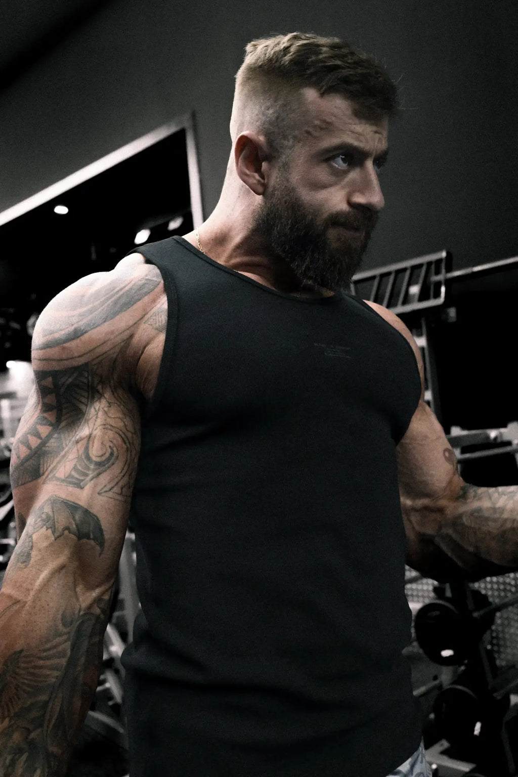 Black ribbed muscle tank top sleeveless athletic shirt ideal for workout or casual wear