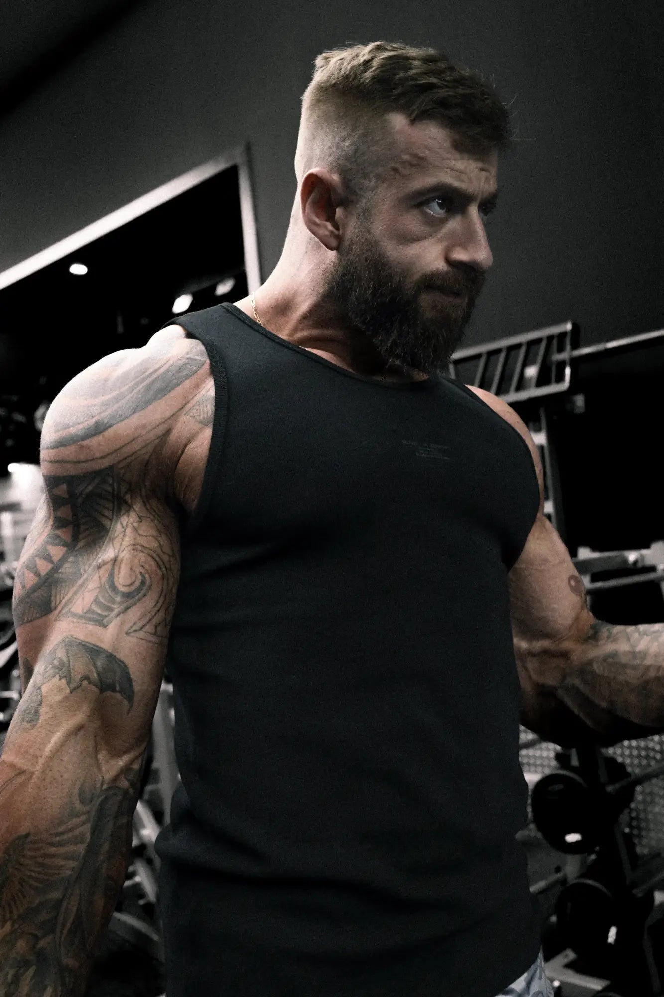 Black ribbed muscle tank top sleeveless athletic shirt ideal for workout or casual wear