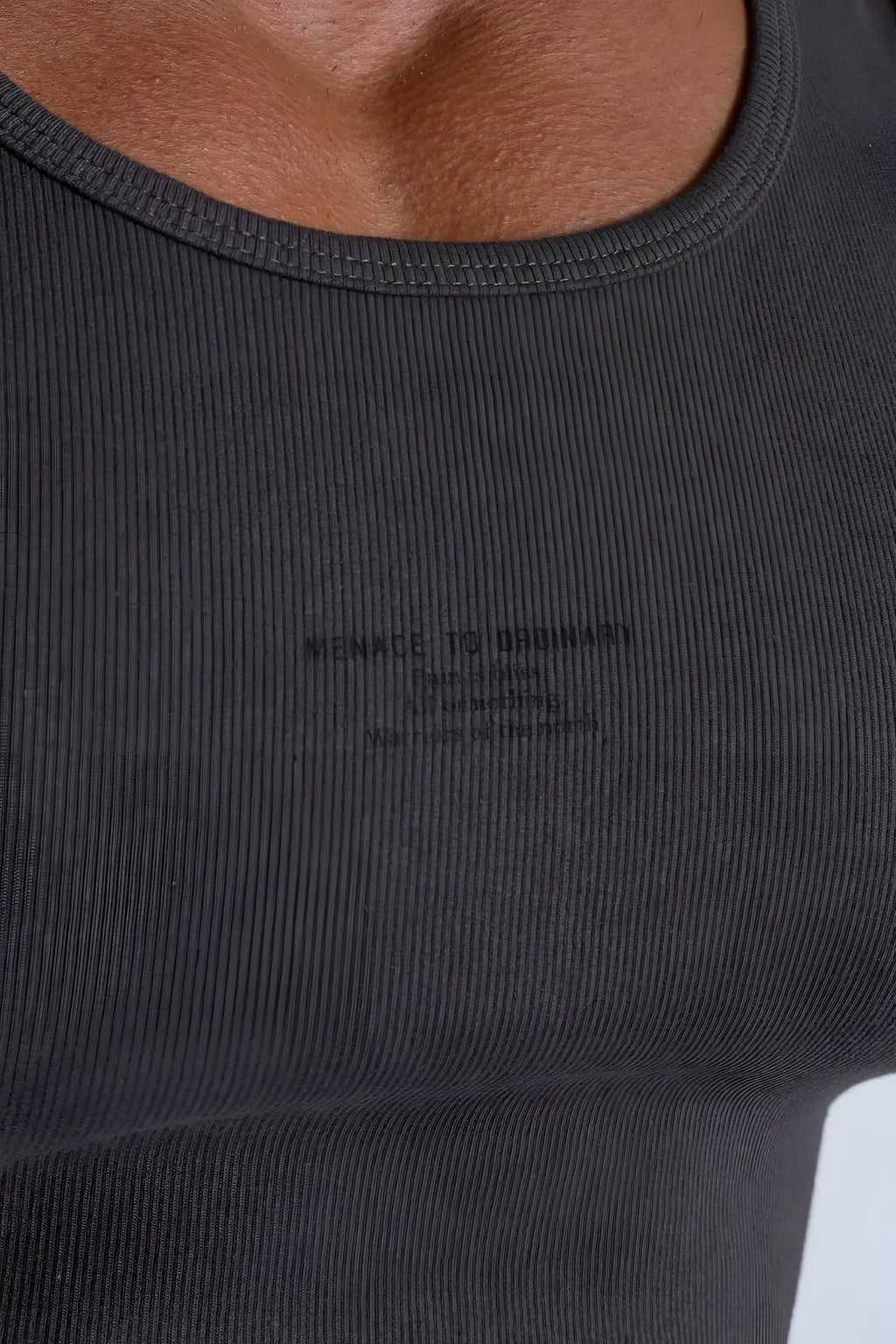 Dark gray ribbed cotton muscle tank top with subtle wonna to ordinary text print