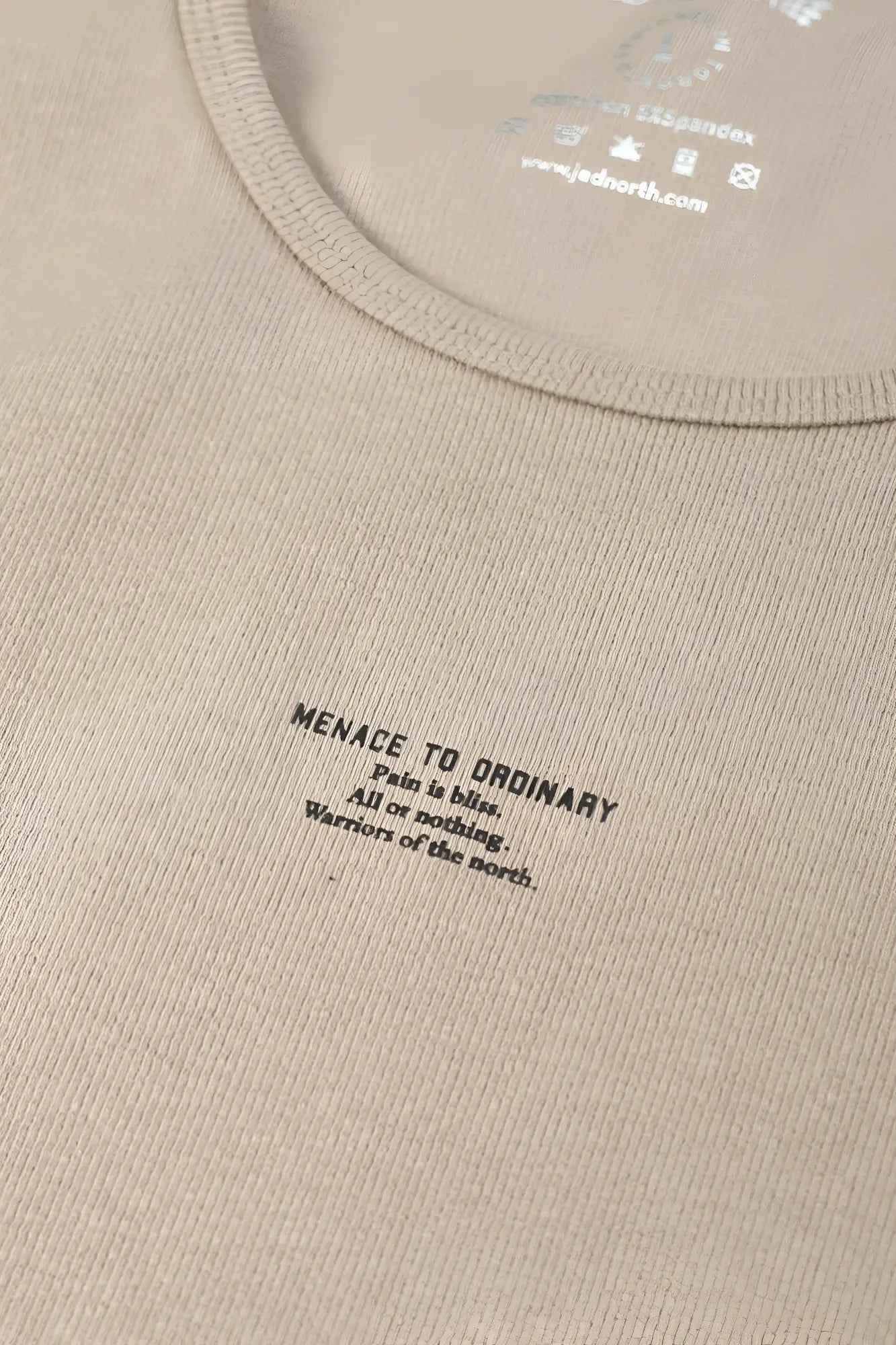 Beige ribbed cotton muscle tank top with black printed text menace to ordinary and a quote in khaki style