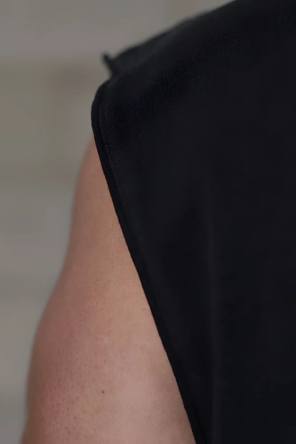 Jed north sleeveless box cut tank top in black with smooth slightly textured fabric for casual wear