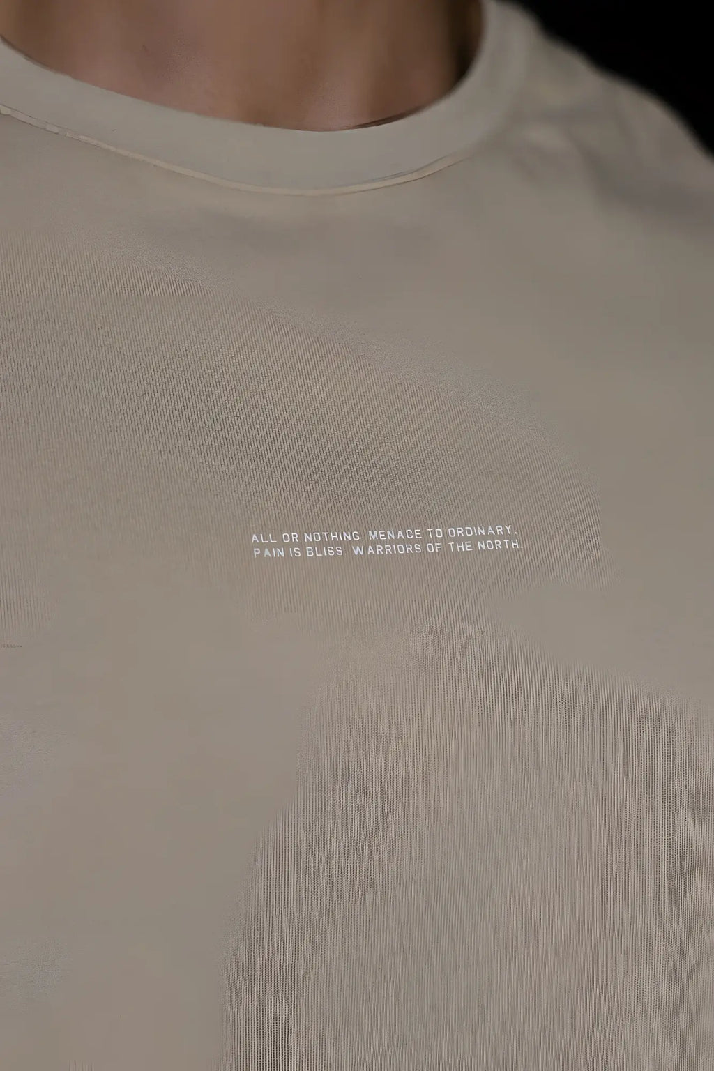 Jed North sleeveless box cut tank top in light khaki with soft off-white crewneck and subtle white chest text