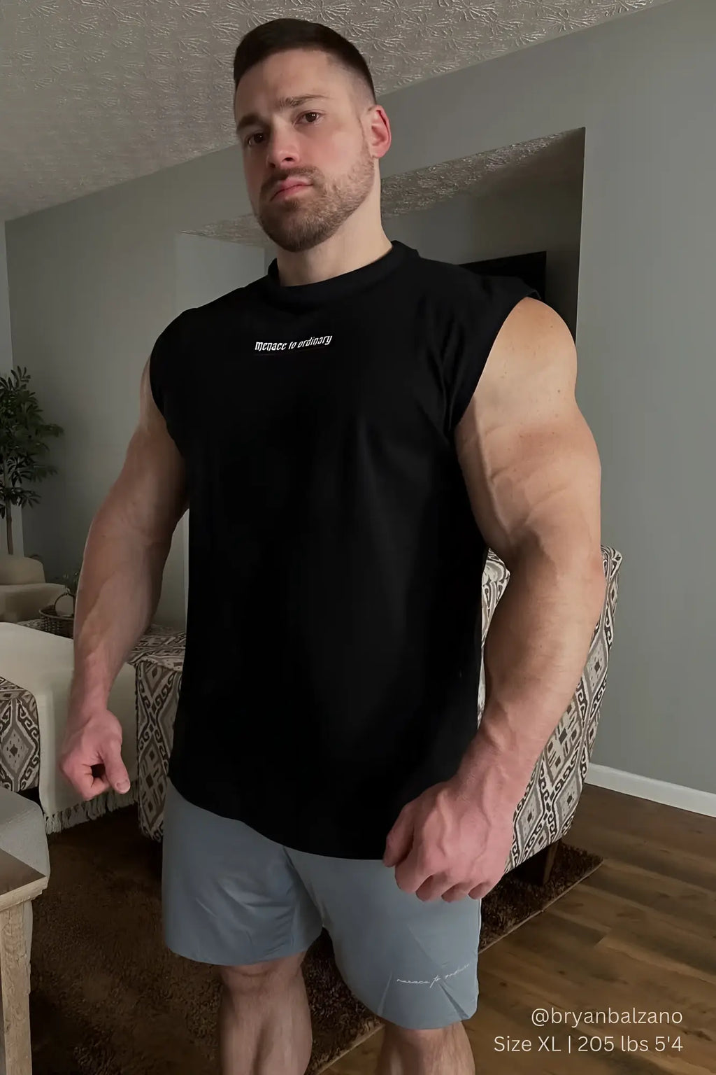 Jed North sleeveless muscle tee black featuring white text across the chest designed for athletic wear