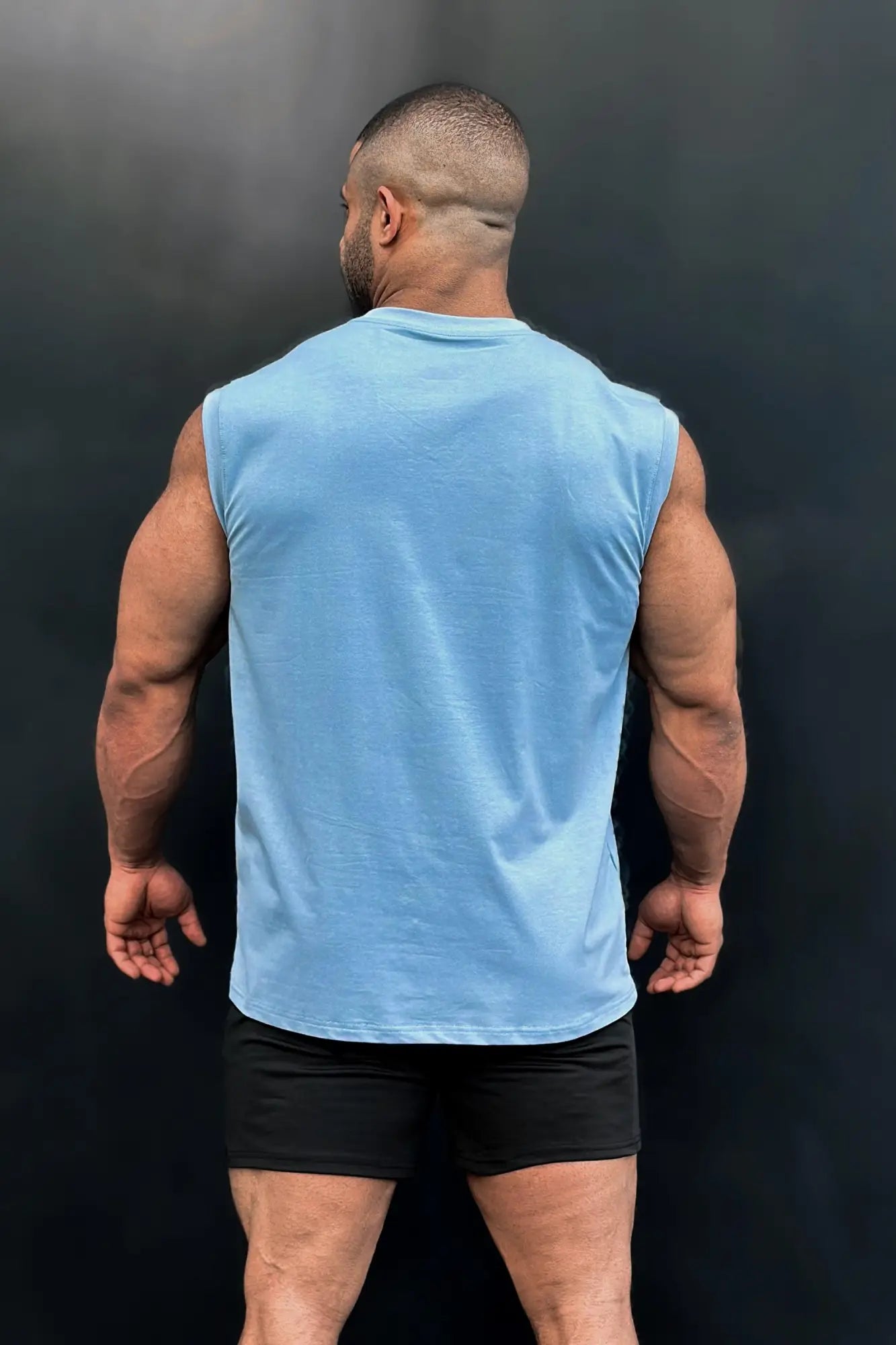 Light blue sleeveless cotton muscle tee with crew neck by Jed North perfect for workouts and casual wear