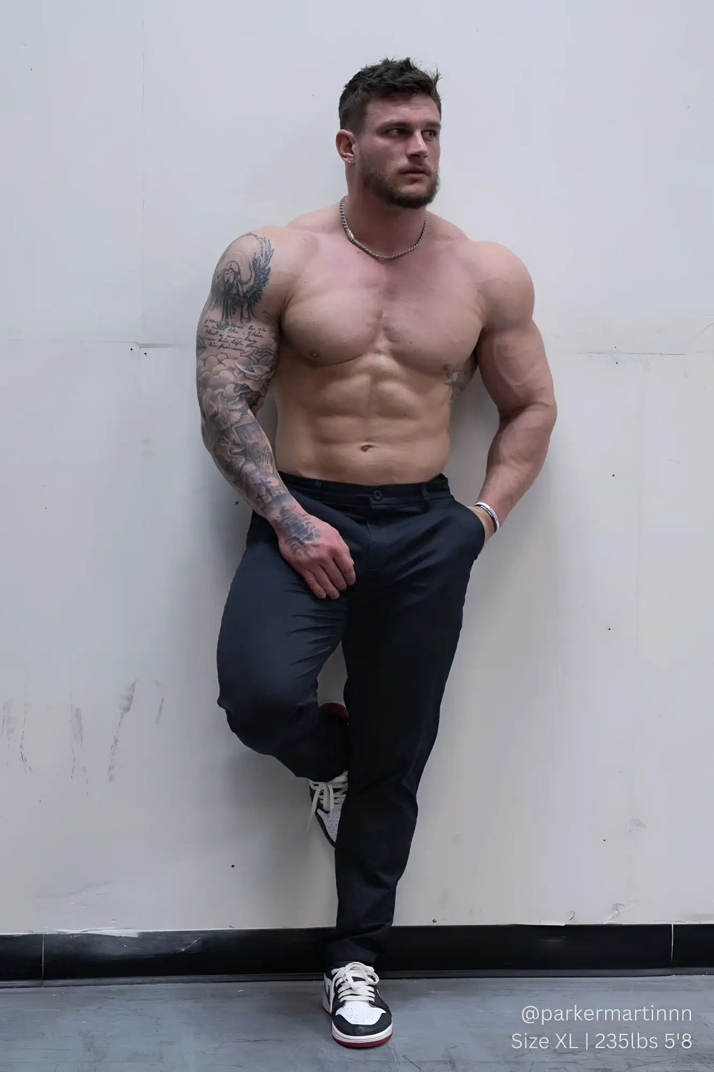 Black slim-fit chino pants with sleek modern design perfect for smart casual wear