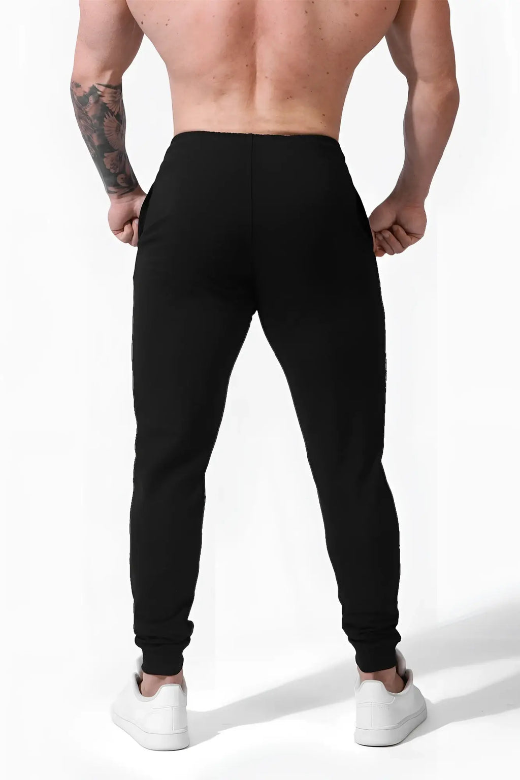 Black spirit joggers with a snug fit and elastic cuffs made from soft breathable fabric for active wear