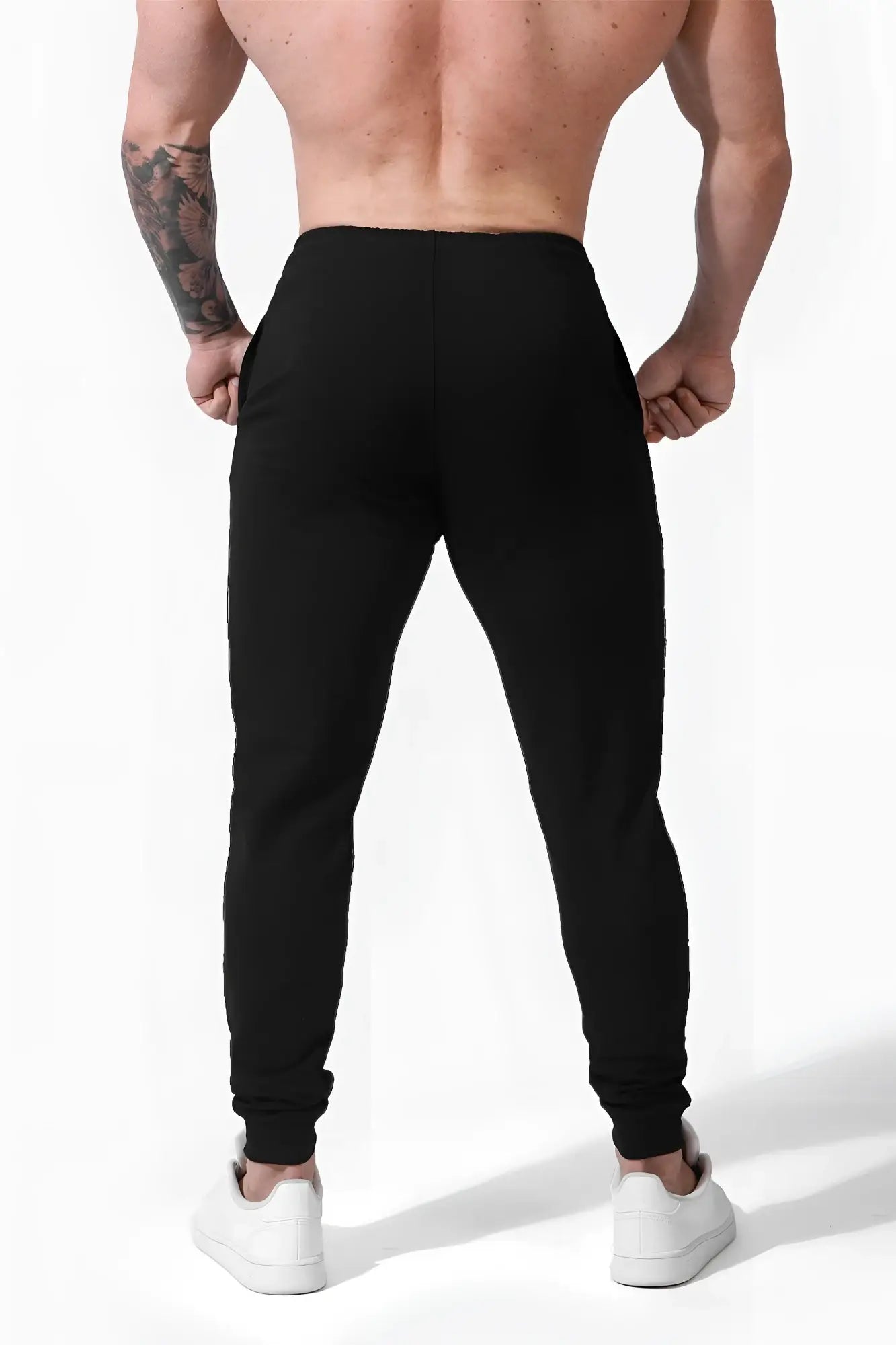 Black spirit joggers with a snug fit and elastic cuffs made from soft breathable fabric for active wear