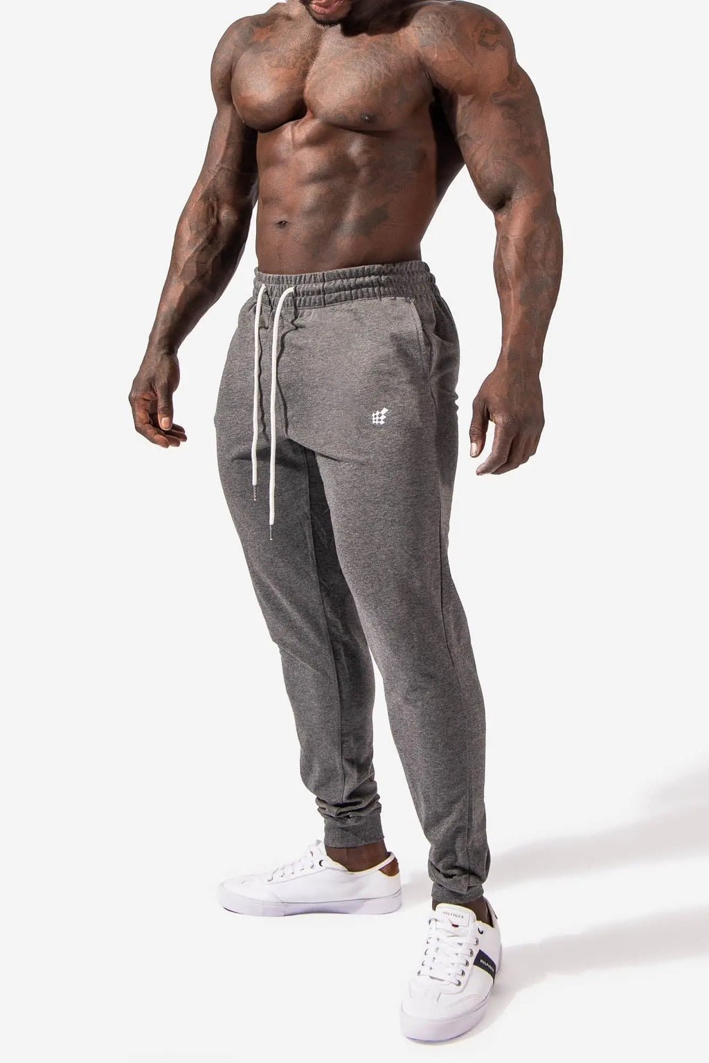 Spirit joggers dark gray gray heathered jogger pants with white drawstrings and small embroidered logo on left thigh