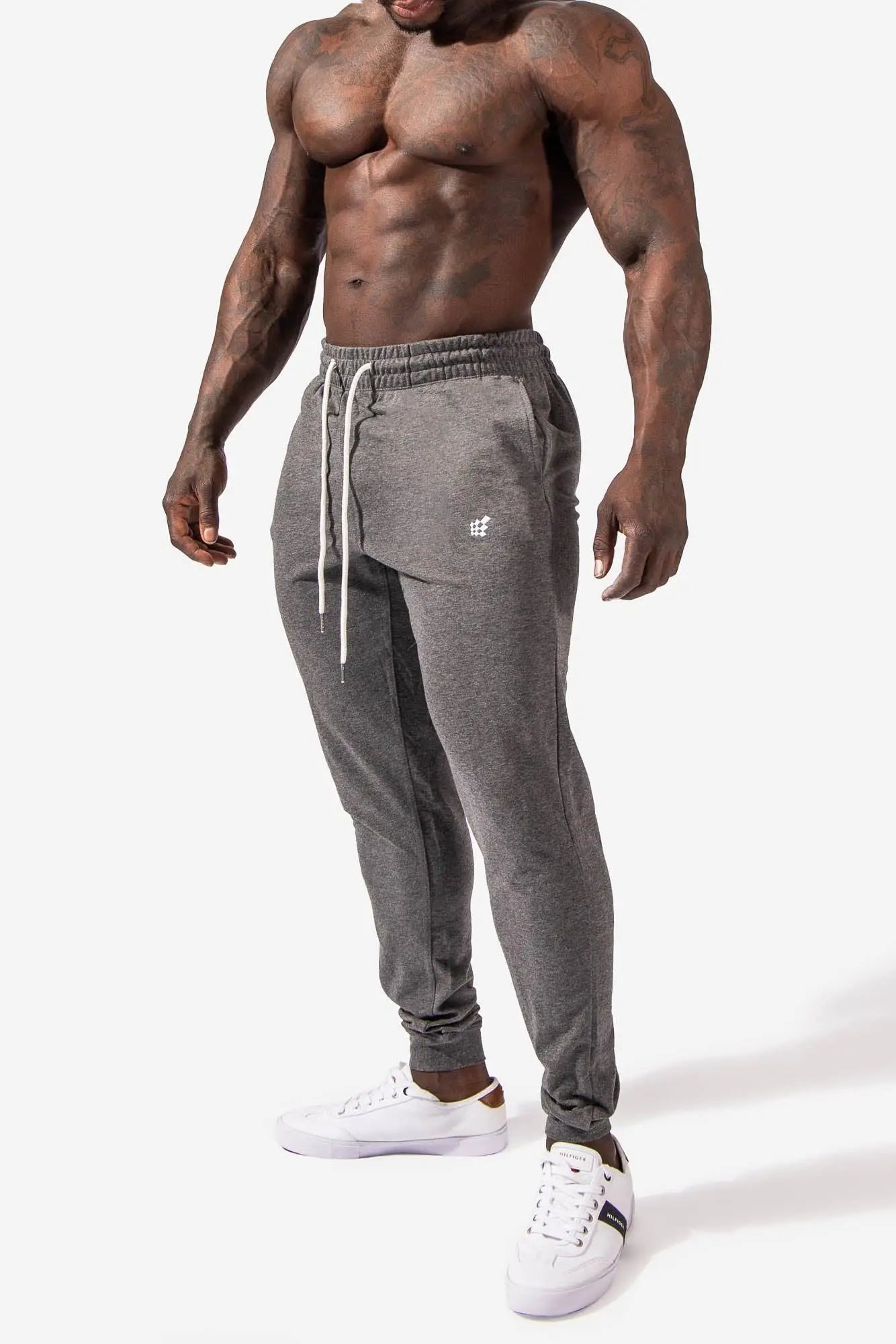 Spirit joggers dark gray gray heathered jogger pants with white drawstrings and small embroidered logo on left thigh