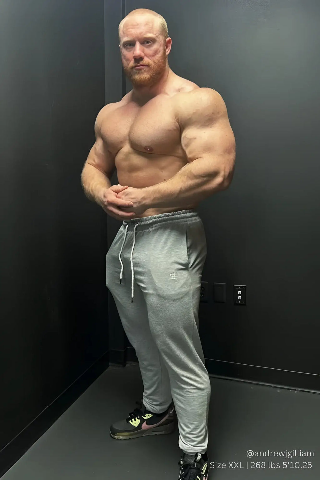 Gray spirit joggers featuring white drawstrings and a small logo on the left thigh perfect for athletic wear