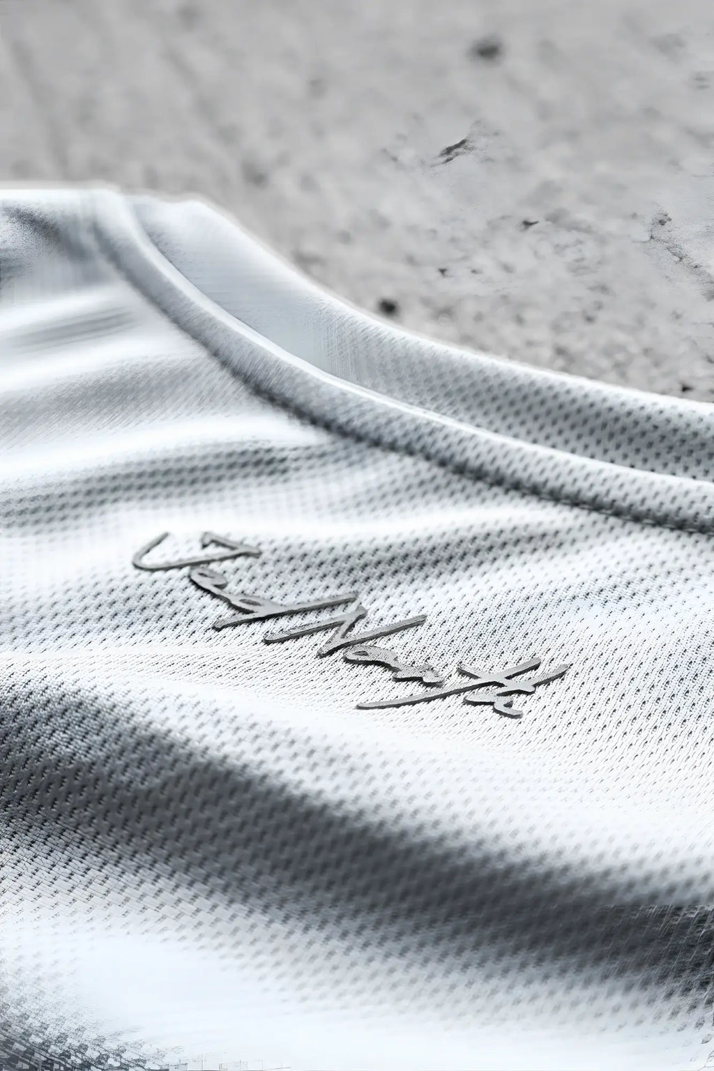 Jed North tactical fast-dry training t-shirt in light gray mesh with subtle silver cursive embroidery on the chest