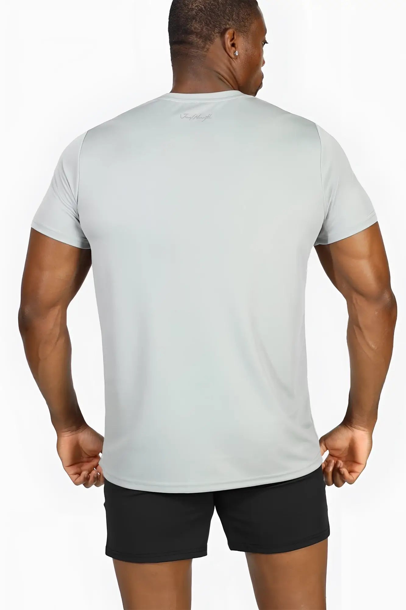Back side of jed north tactical fast-dry training t-shirt in polar silver light gray with subtle logo on collar